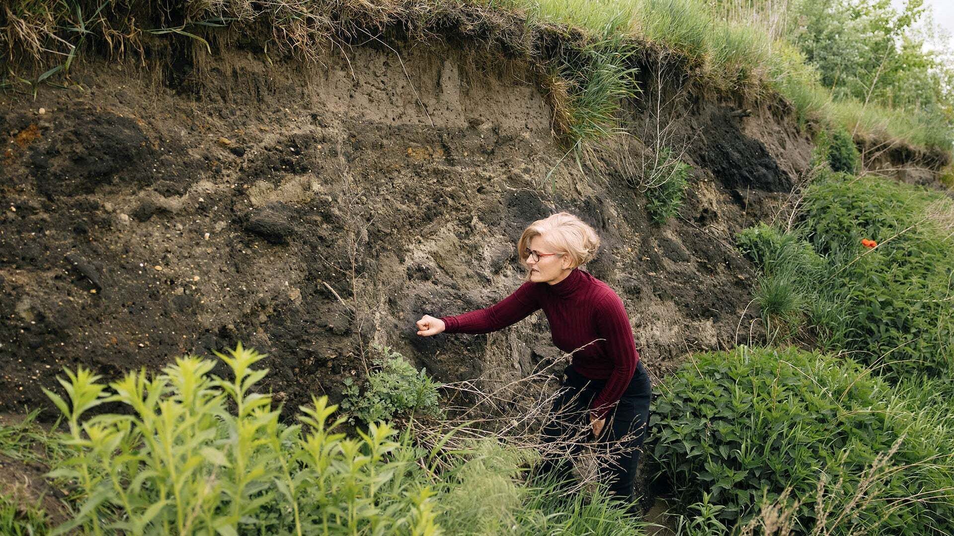 Antje Arnold touches earth on a slope