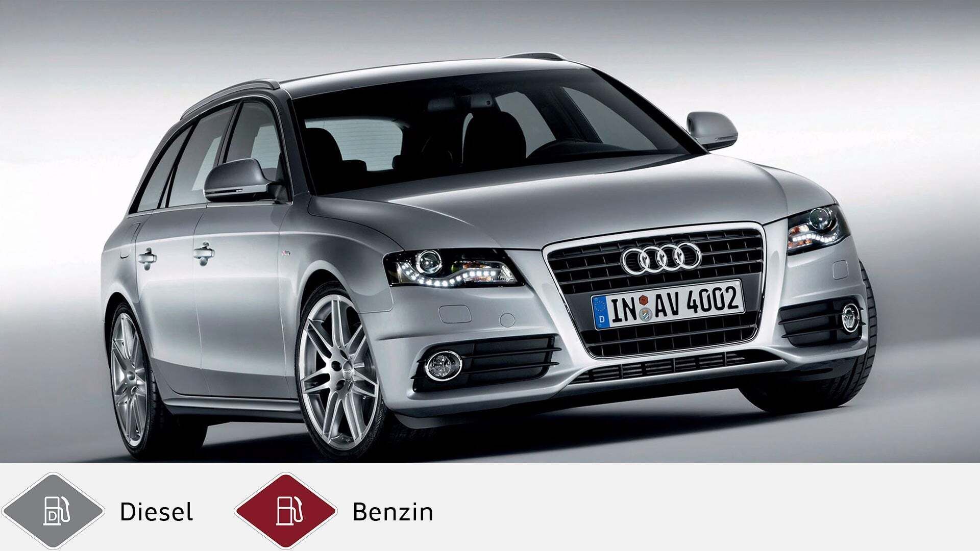 Silberner Audi A4 Avant auf hellgrauem Hintergrund, Blick leicht frontal. Unten graues Dieselsymbol und rotes Benzinsymbol.