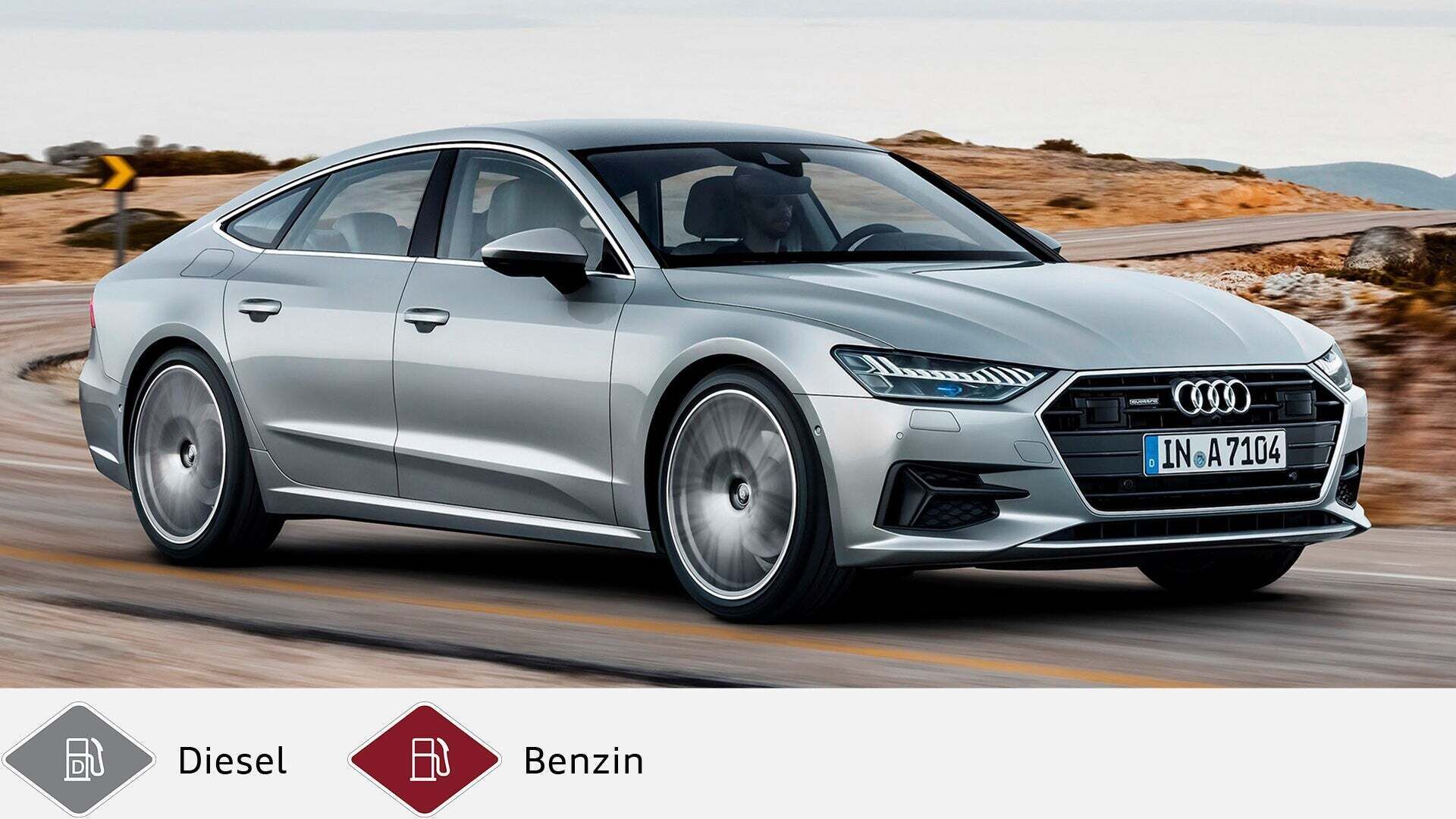Silberner Audi A7 Sportback fährt auf kurviger Straße mit Landschaft im Hintergrund. Unten graues Dieselsymbol und rotes Benzinsymbol.