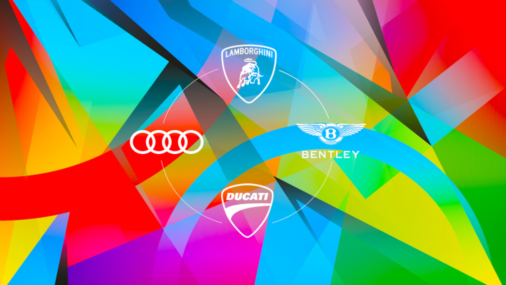 Auf buntem Hintergrund sind alle vier Logos des Audi Konzerns zu sehen: Audi, Bentley, Lamborghini und Ducati.