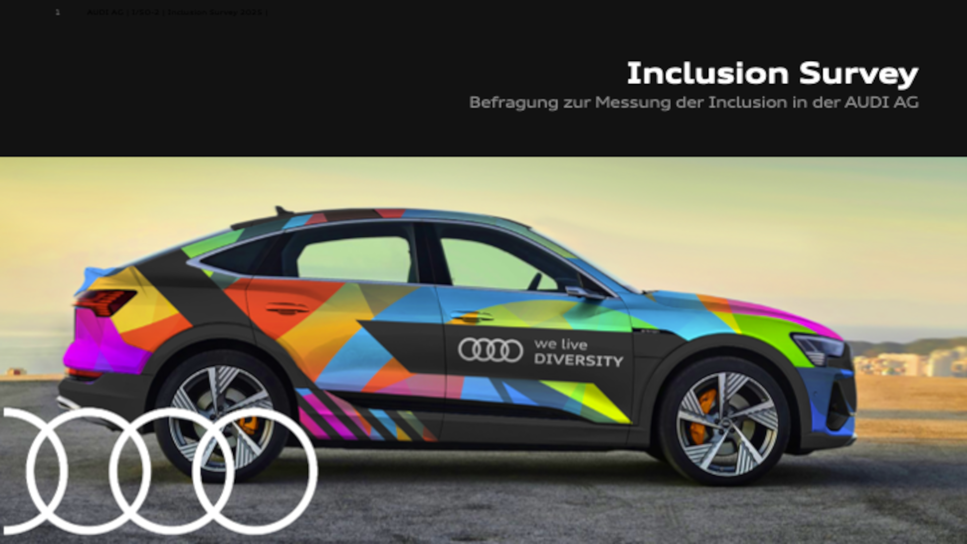 Bunter Audi Q4 e-tron mit dem Schriftzug „We live Diversity"