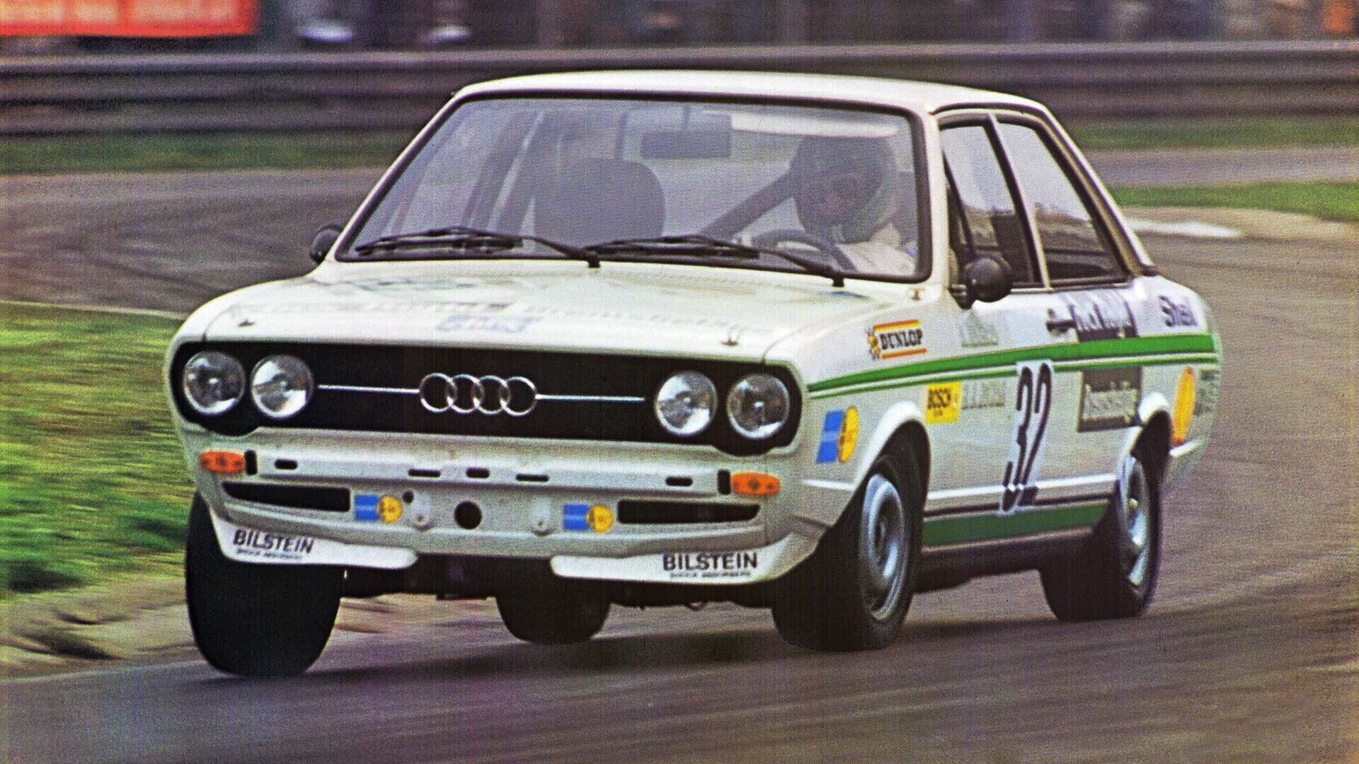 A picture showing an Audi 80 race car on track.