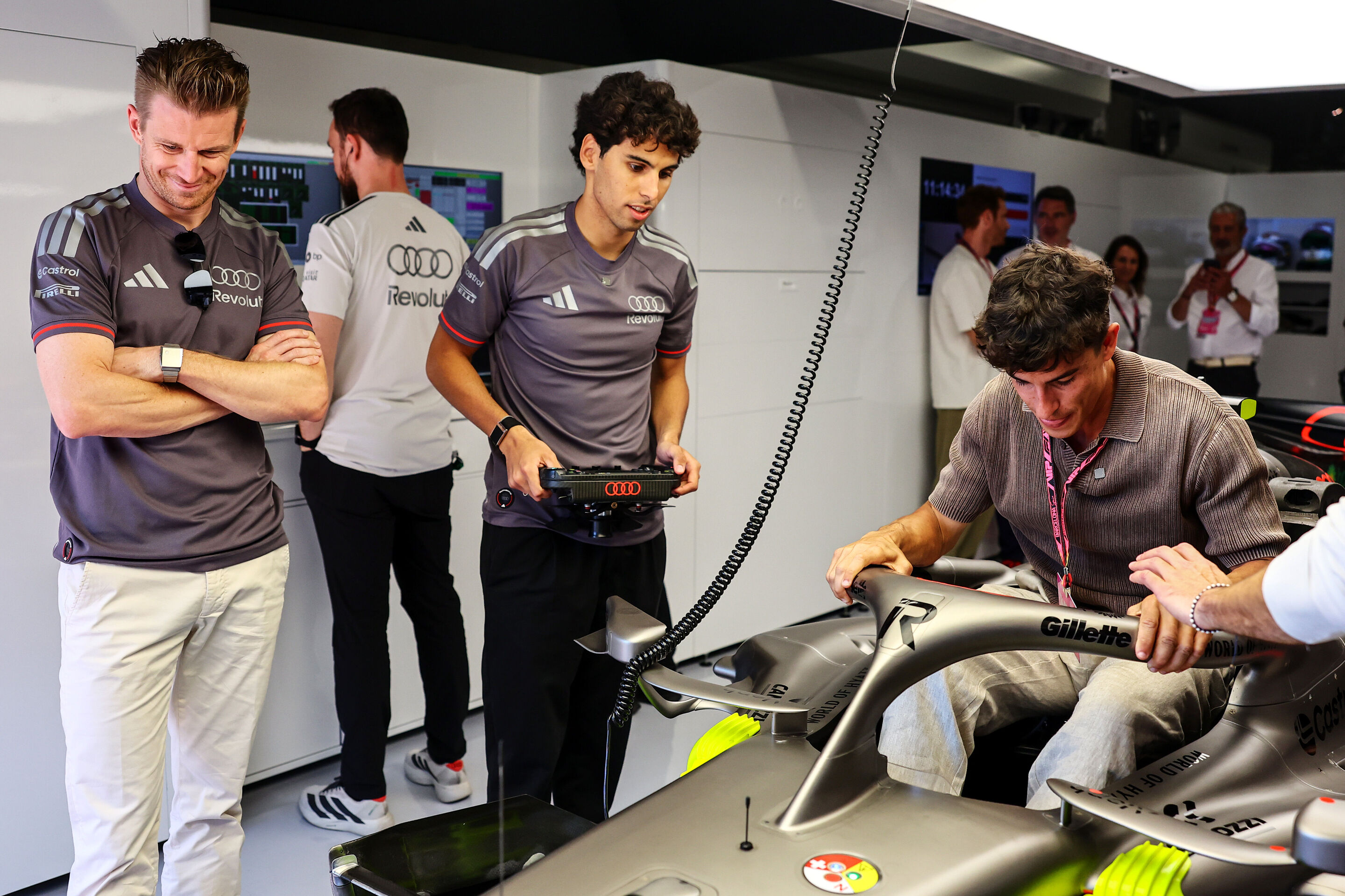 Audi Revolut F1 Team: Barcelona Grand Prix - Ducati factory driver Marc Marquez visits Audi Revolut F1 Team. With Gabriel Bortoleto and Nico Hulkenberg.