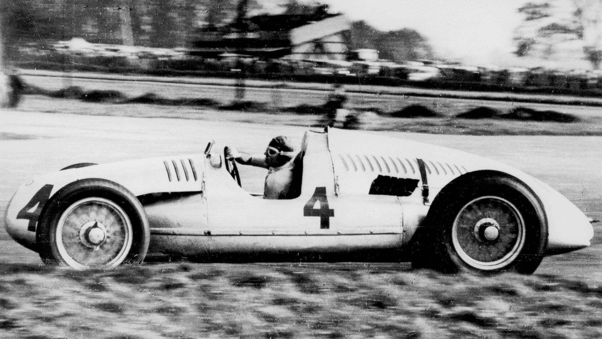 Tazio Nuvolari drove the Auto Union 12-cylinder Type D racing car (start number 4) to victory in the 1938 Grand Prix at Donington Park, Great Britain - Tazio Nuvolari