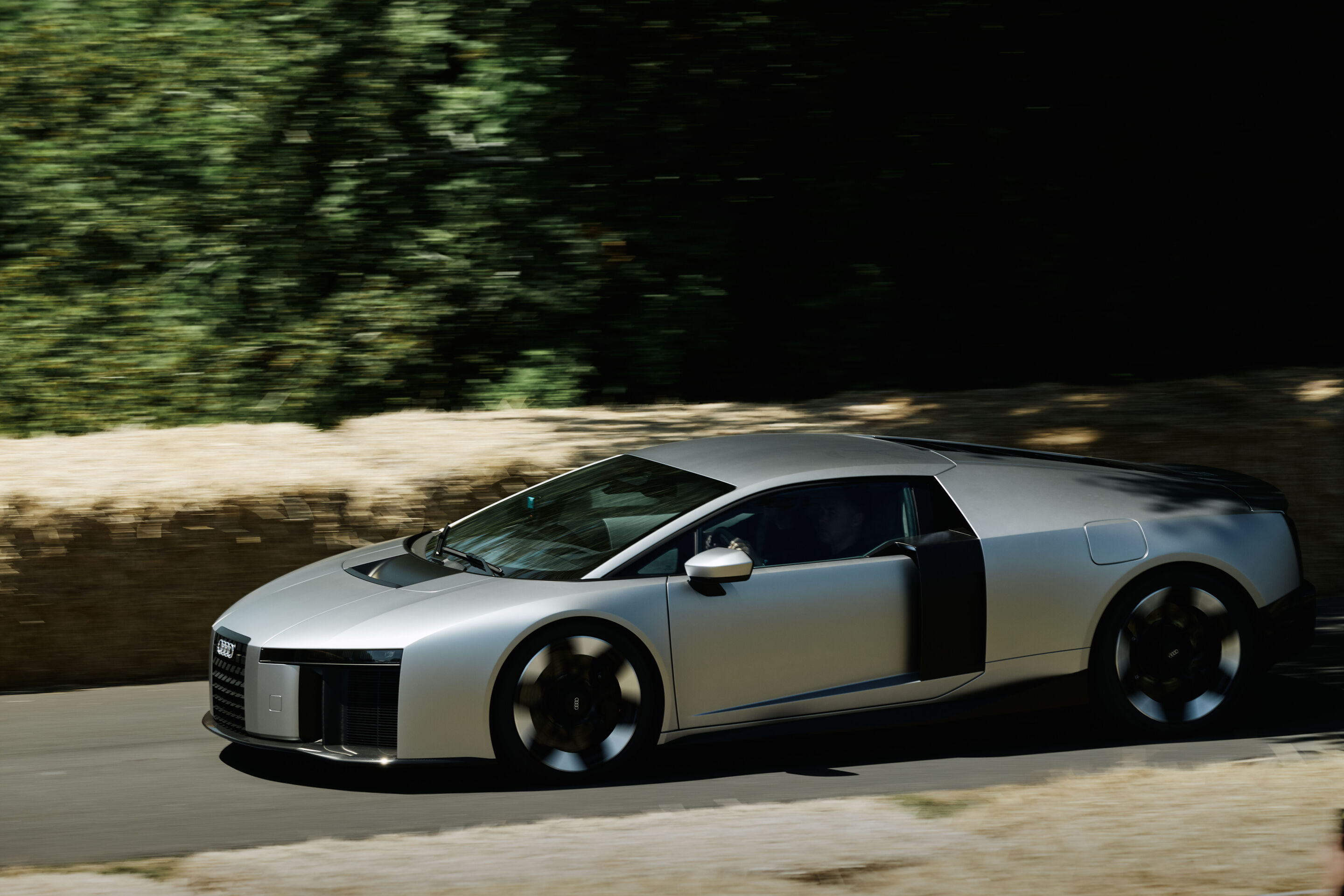 Audi Nuvolari at Goodwood Festival of Speed - Racing legend Tom Kristensen races Audi Nuvolari up the 1.86-kilometer Hillclimb in the grounds of Goodwood House. The Nuvolari is the fastest and most powerful production vehicle in the brand’s history —...