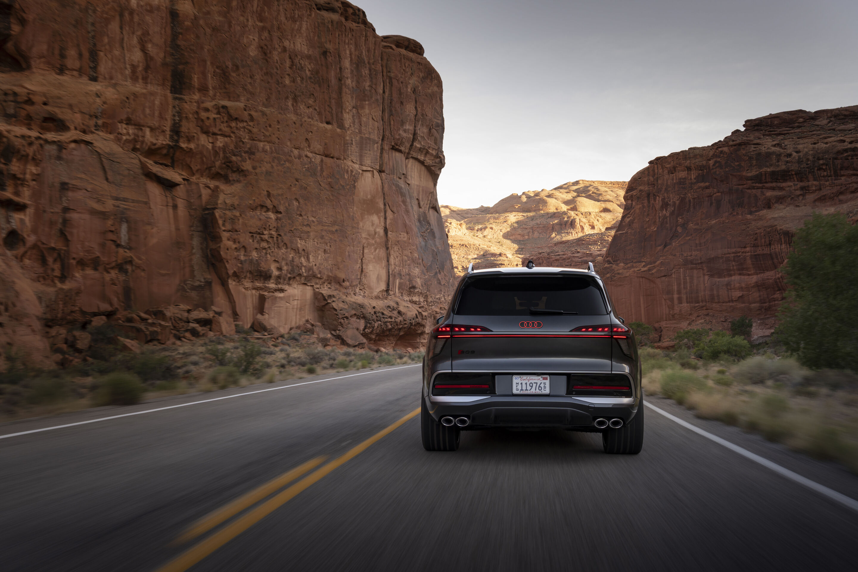 Audi SQ9 SUV - Daytona grey metallic, dynamic photo, exterior, rear view