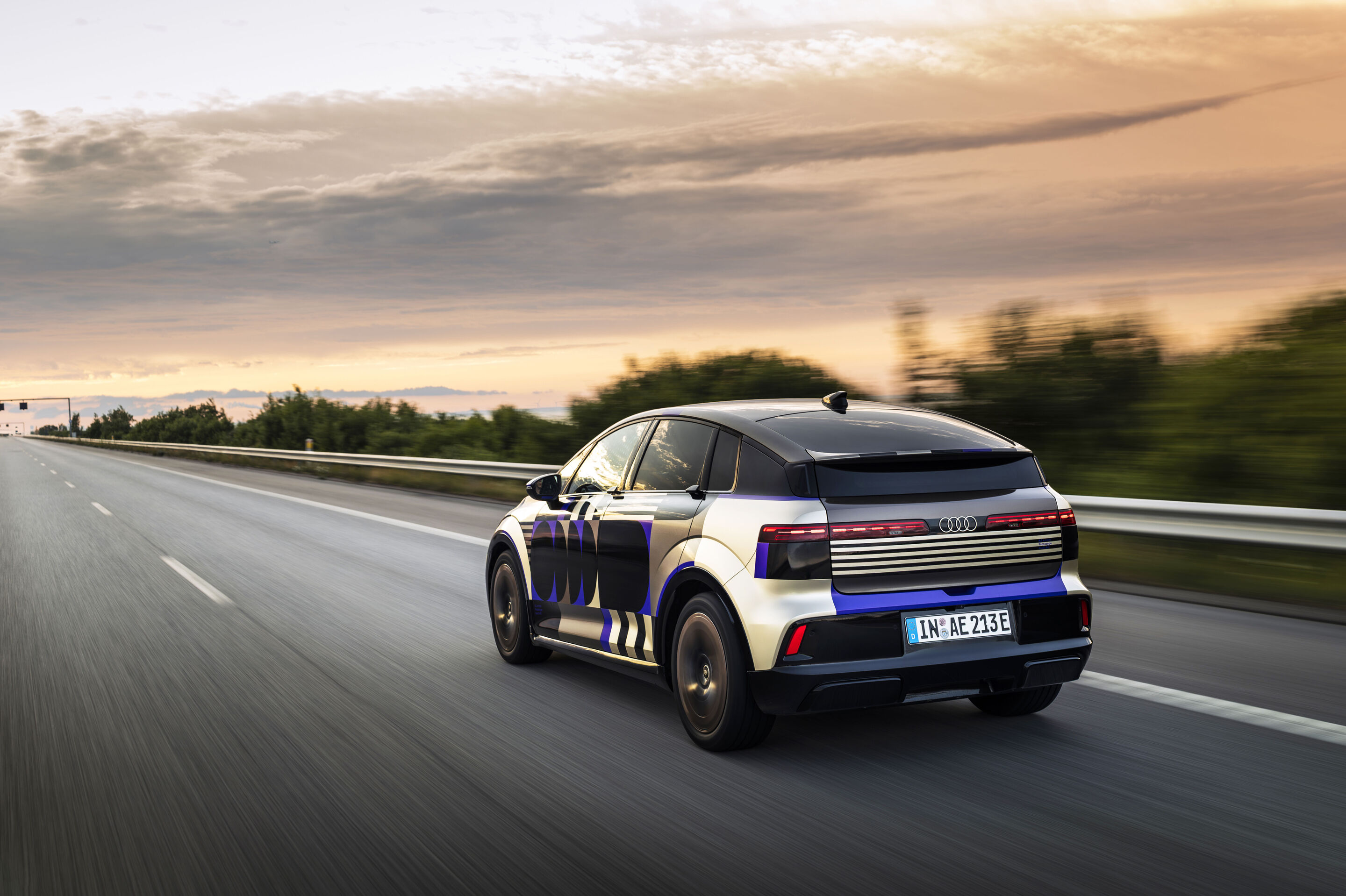 Audi A2 e-tron with design livery - Outdoor dynamic shot, exterior, three-quarter-rear-view