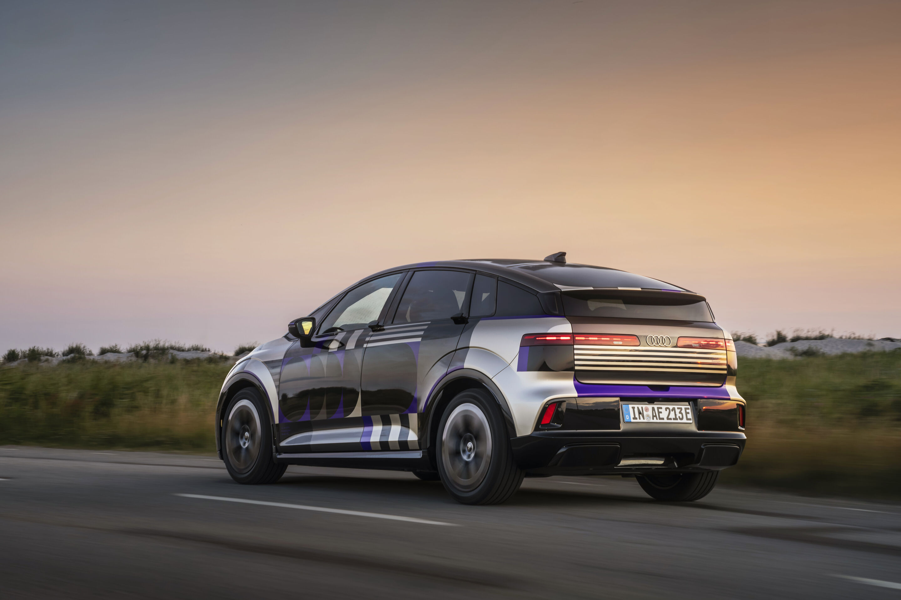 Audi A2 e-tron with design livery - Outdoor dynamic shot, exterior, three-quarter-rear-view