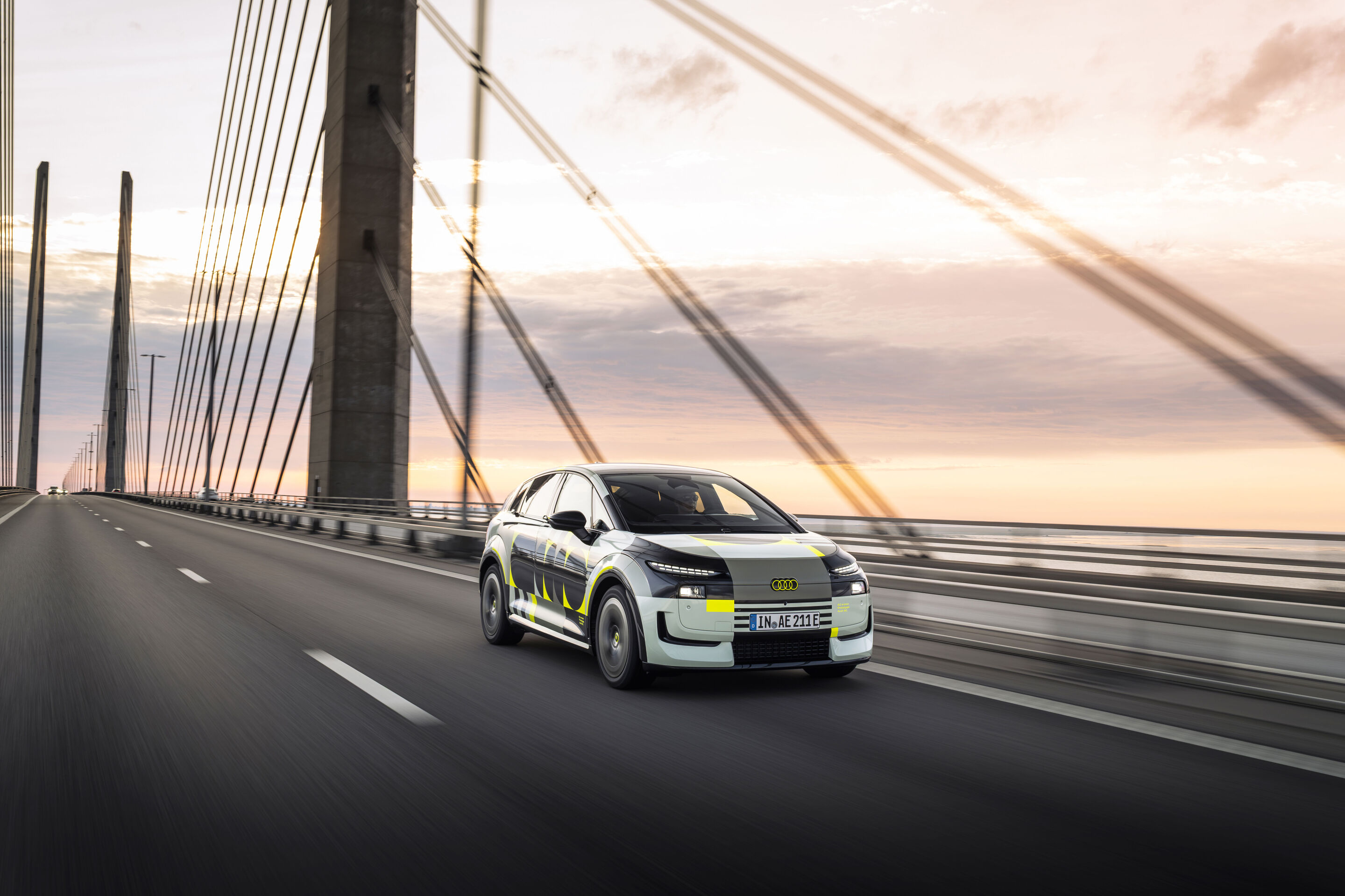 Audi A2 e-tron with design livery - Outdoor driving shot, exterior, front three-quarter view.
