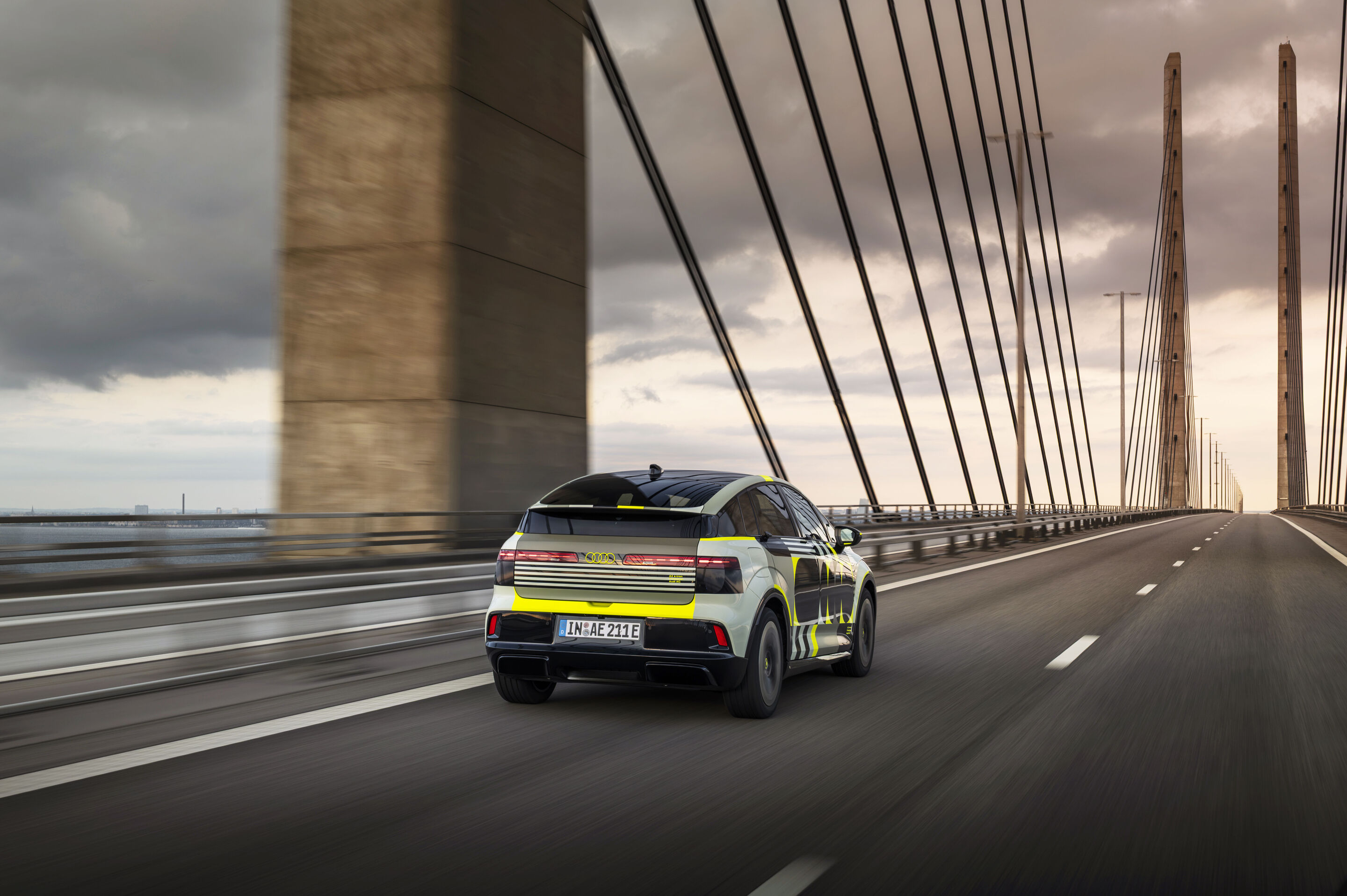 Audi A2 e-tron with design livery - Outdoor driving shot, exterior, three-quarter-rear-view