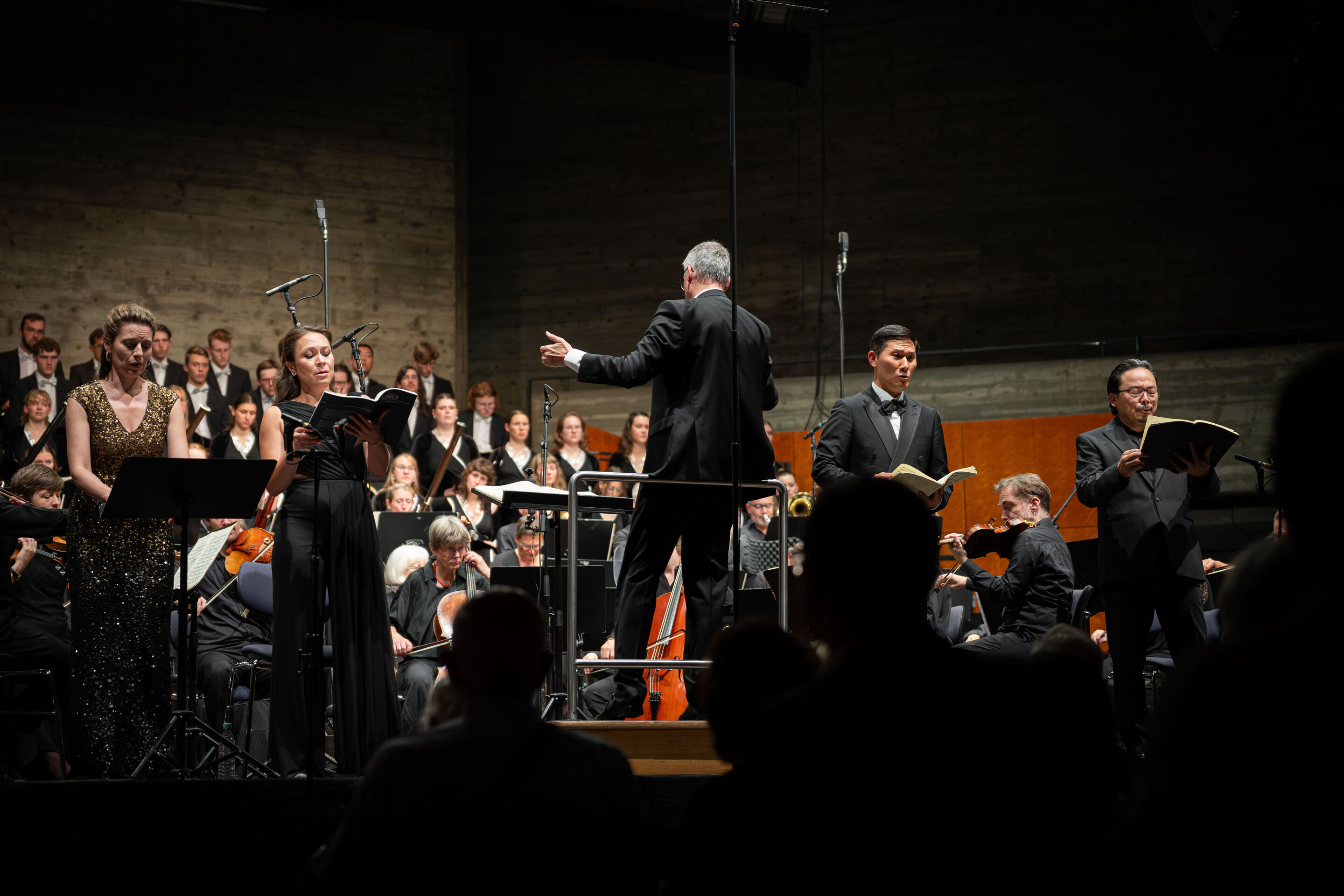 Audi Summer Concerts 2026: Closing concert - View from the audience of the stage in the Festsaal Ingolstadt. In front of the Akademie für Alte Musik Berlin and the Audi Youth Choir Academy are the soloists Chen Reiss, Irene Roberts, Sung Min Song, and...