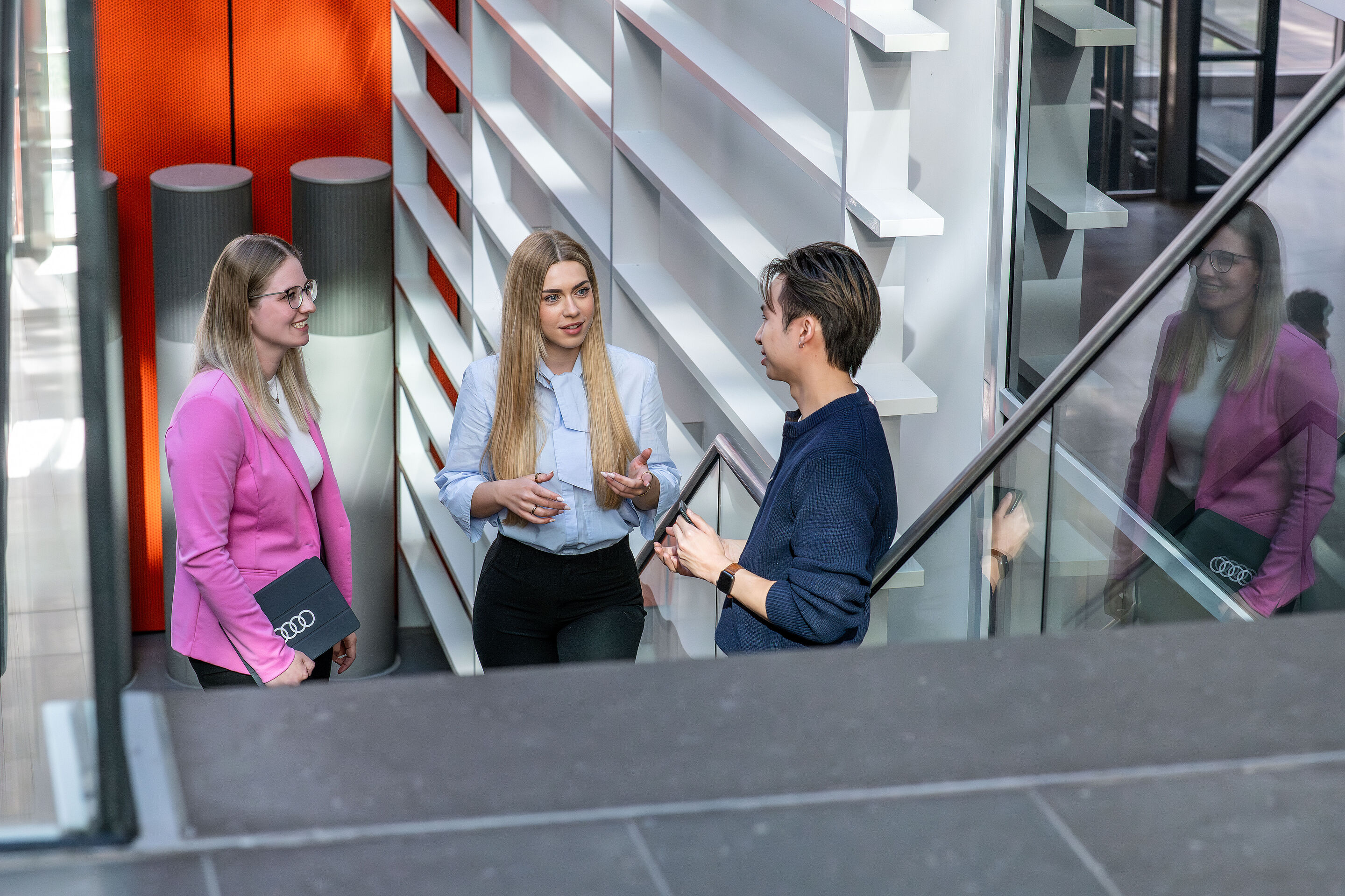 3 Students standing in a meeting - 3 Students standing in a meeting