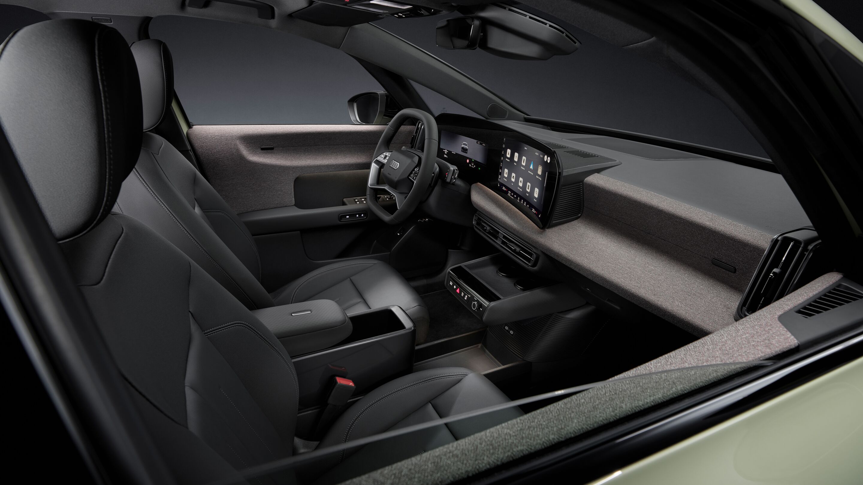 Audi A2 e-tron - Farbe: Pistaziengrün, Studioaufnahme, Interieur, Cockpit aus Sicht der Beifahrerseite, MMI-Panoramadisplay, Touchdisplay im Curved Design, stoffbezogene Oberfläche Softwrap und Mittelarmlehne mit modularem Fidlock-Befestigungssystem