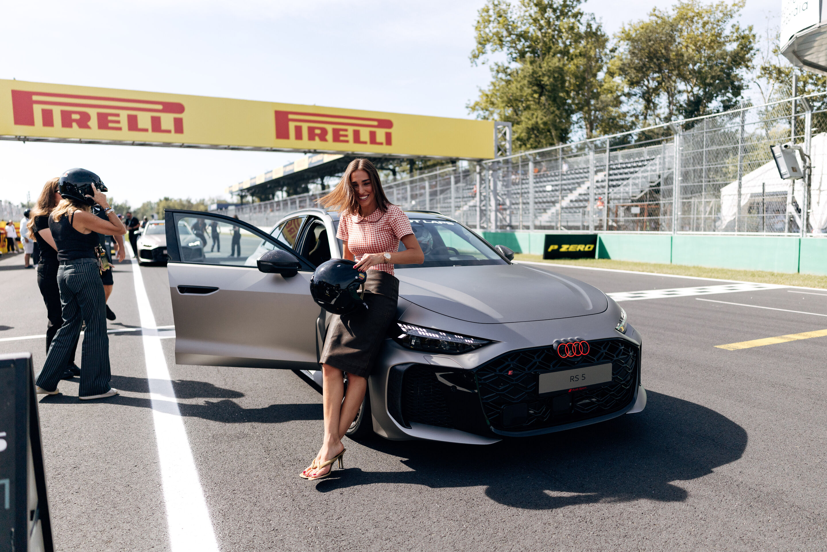 Audi Revolut F1 Team: Grand Prix von Italien - Mode-Influencerin Ginevra Mavilla mit dem Audi RS 5 Avant während der F1® Pirelli Hot Laps im Rahmenprogramm der Formel 1 in Monza
