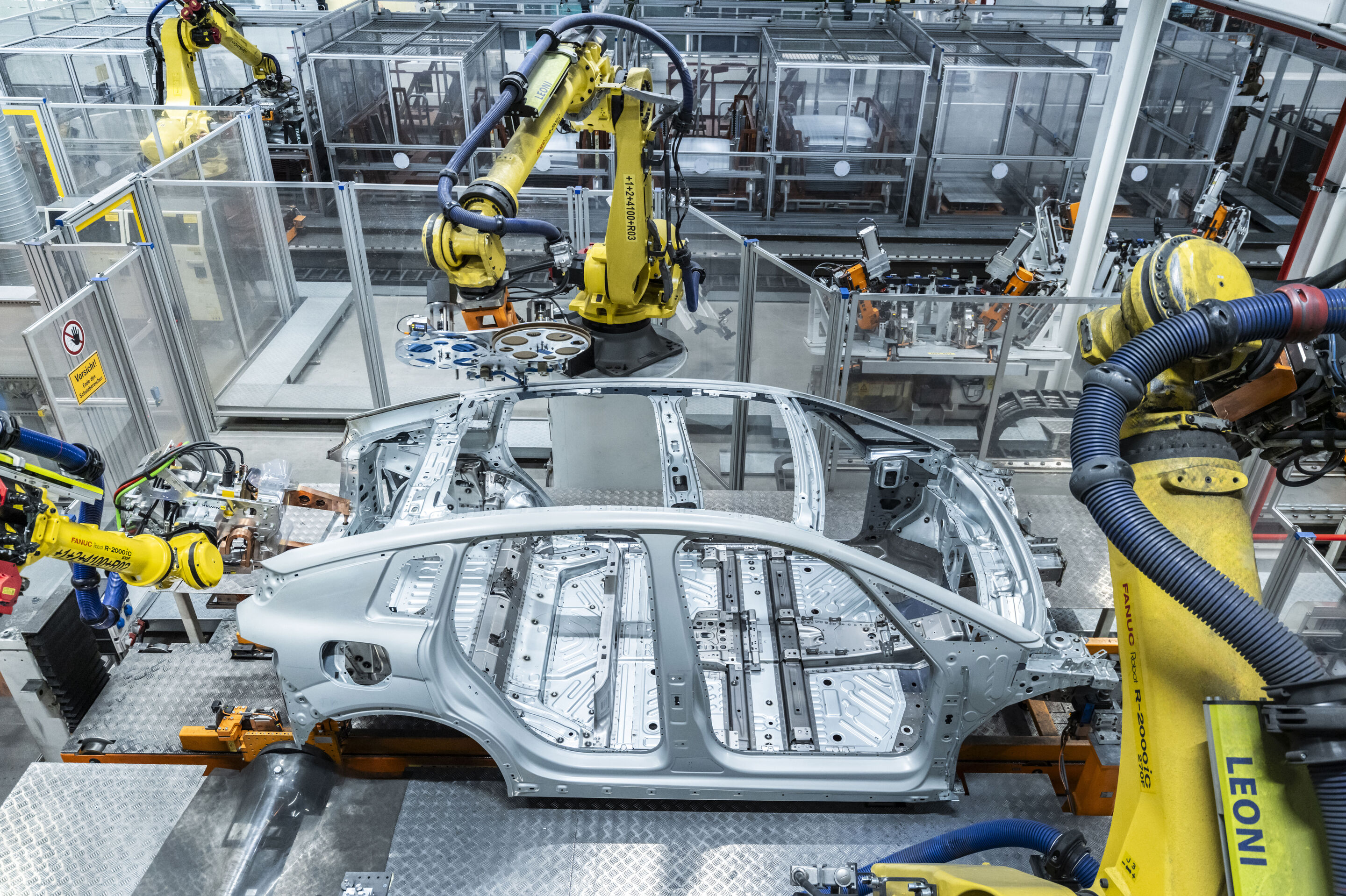 Audi A2 e-tron production at the Ingolstadt site - More than 1,200 production components, including robot welding guns and around 250 robots that have already been used in the production of other Audi models, are being reused or repurposed.