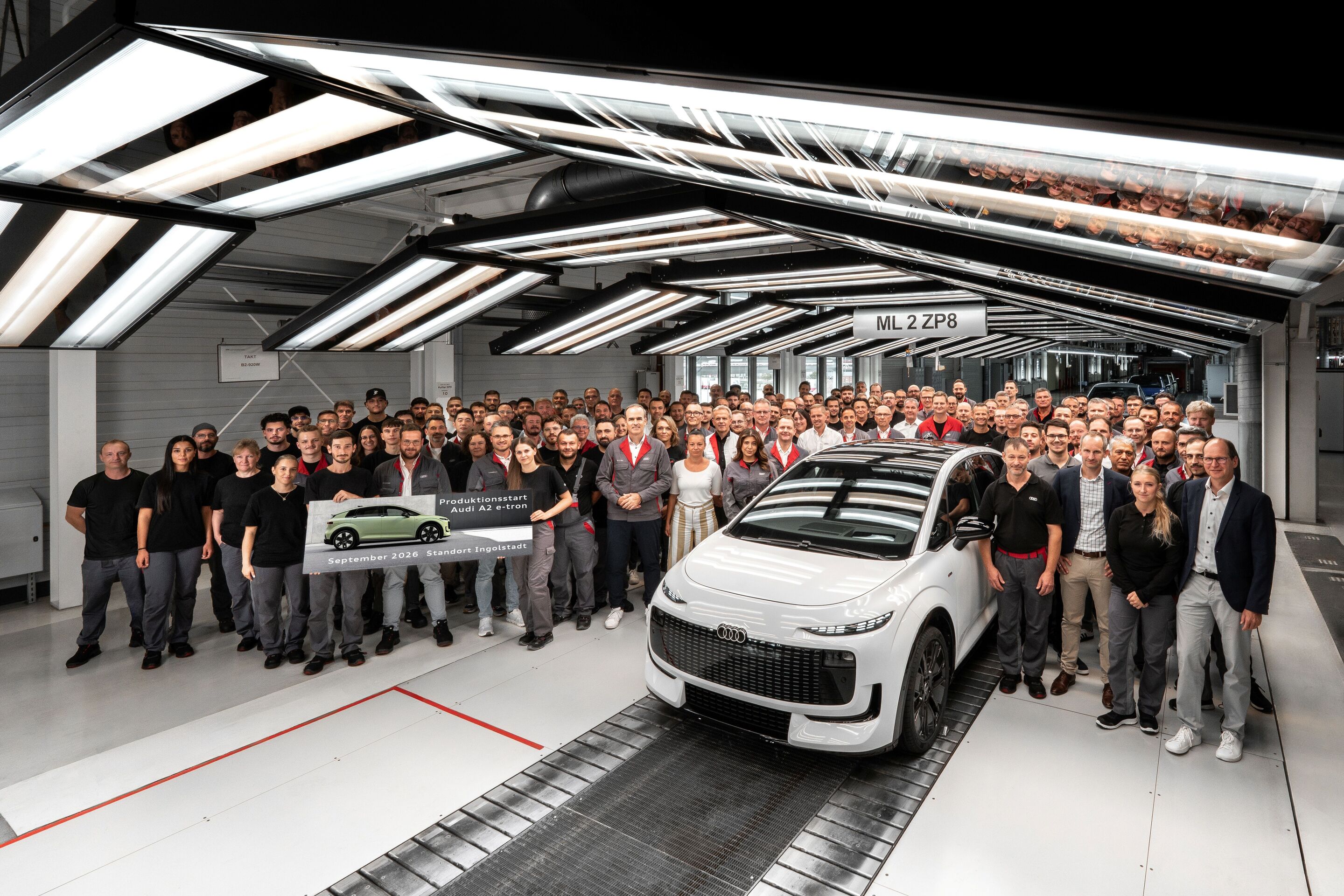 Audi A2 e-tron production at the Ingolstadt site - Production employees celebrate the start of Audi A2 e-tron production in Ingolstadt.