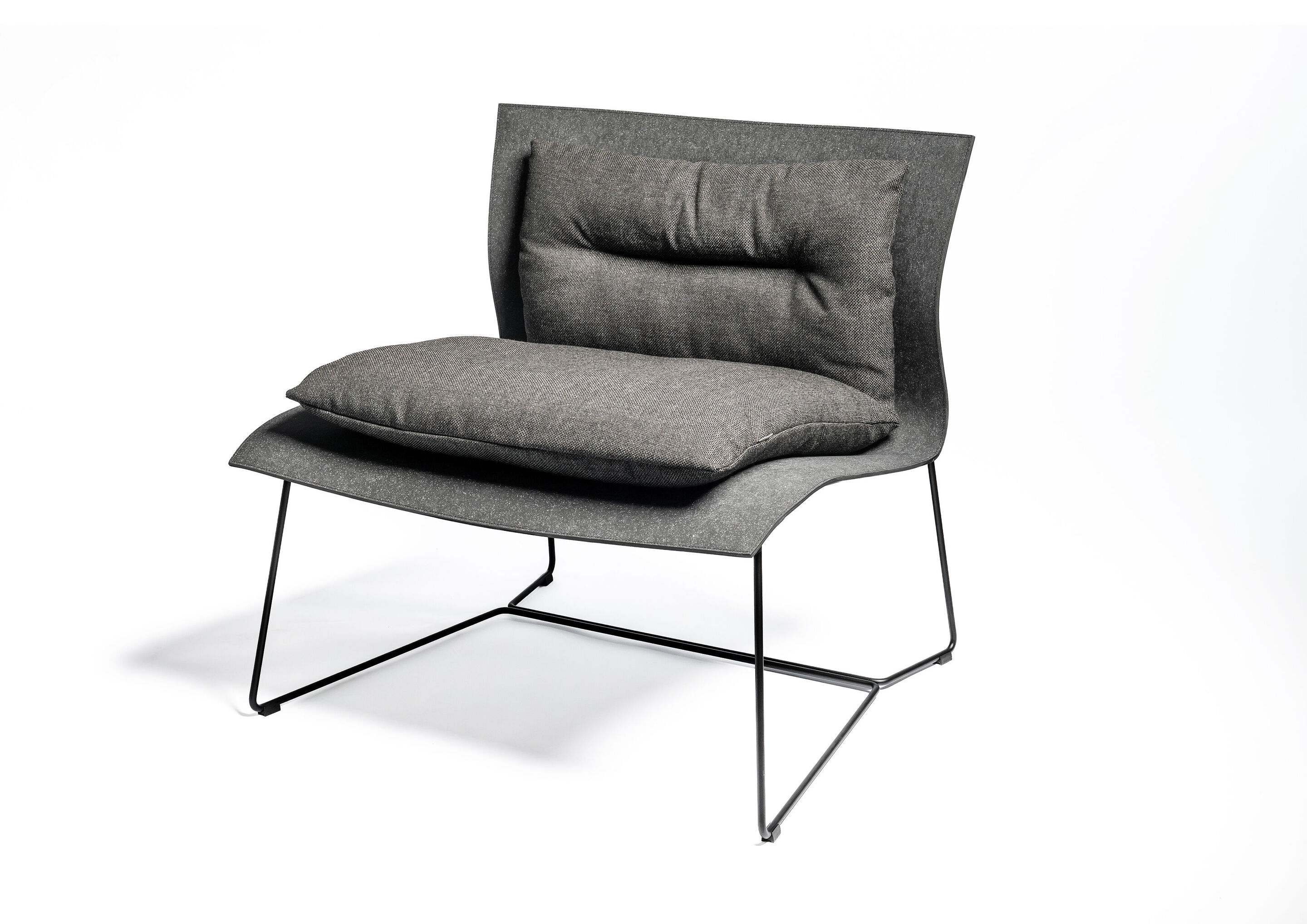 Audi Corporate Architecture, Cuoio Lounge Chair Front View - Cuoio Lounge Chair: The seat shell is made of a material that is made from a high proportion of recycled leather scraps from the consumer goods industry