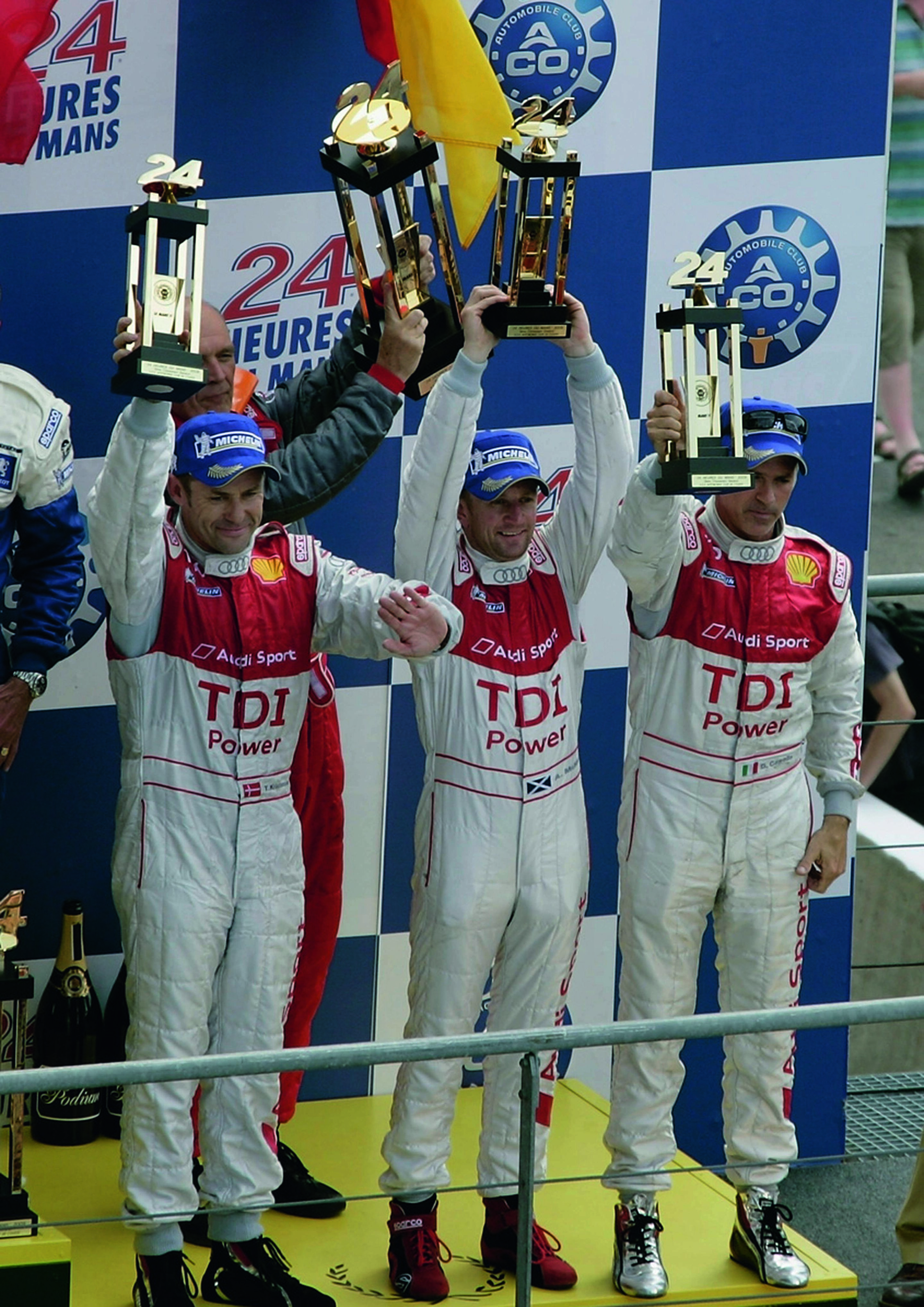 Anniversary magazine Motorsports - Le Mans 2009 - Audi joy on the Le Mans podium, for the eleventh time in succession.