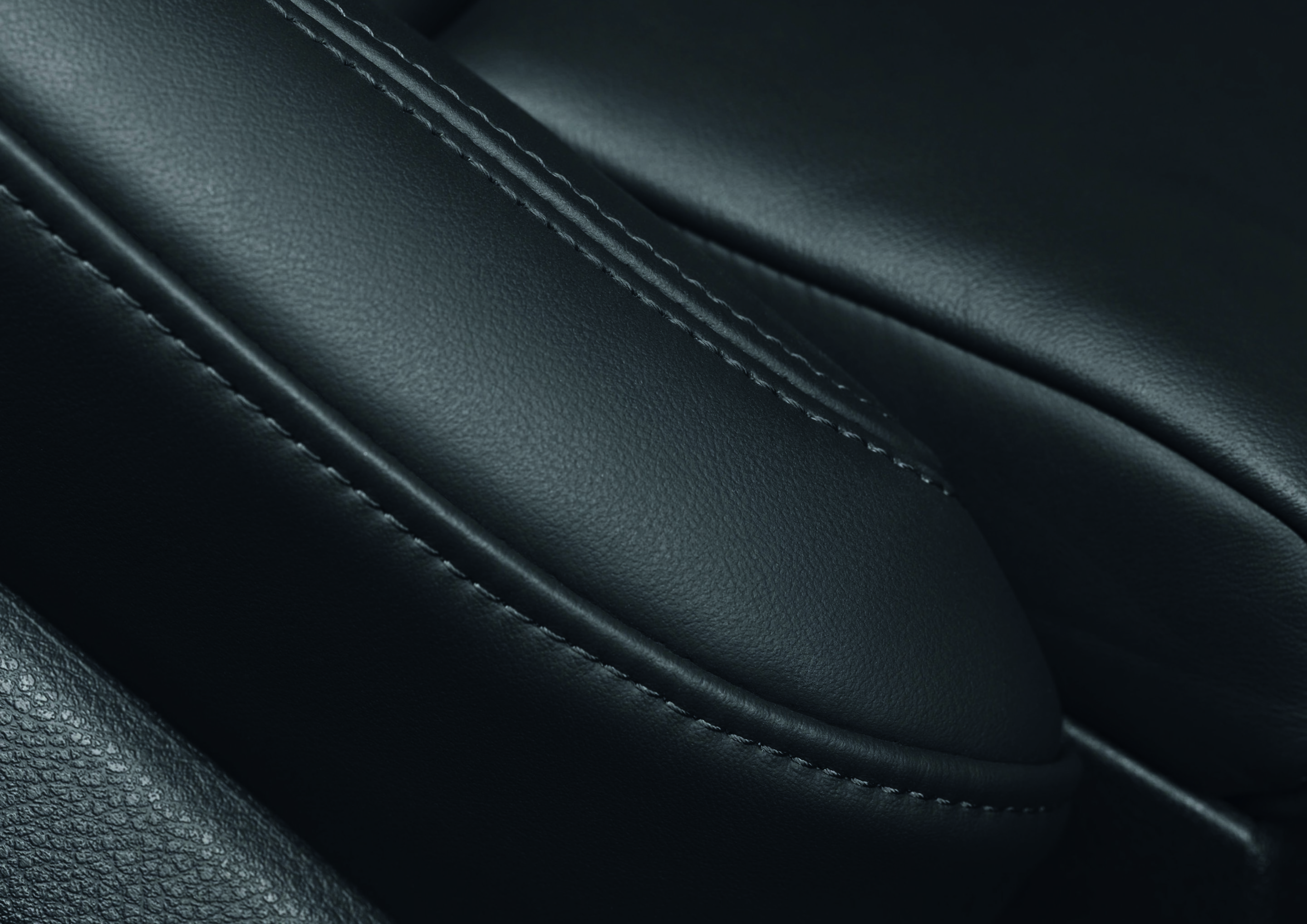 Anniversary magazine Design - Perfection - selected surfaces, precision sitching, perfect craftsmanship - ultimately, an Audi should lose none of its fascination, even after many years.