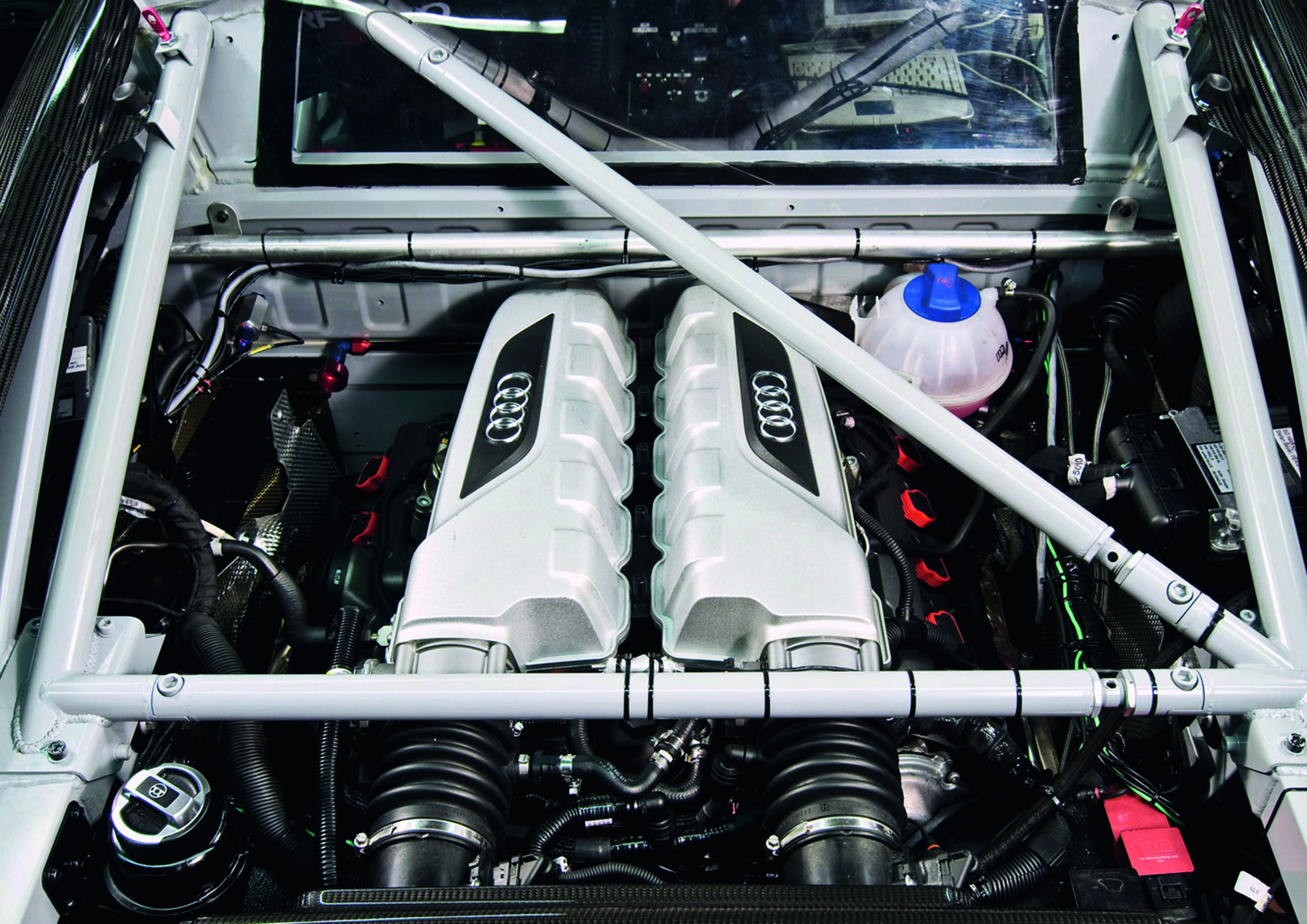 Anniversary magazine Motorsports - Audi R8 LMS - the V10 mid engine delivers more than 500 hp and is almost identical with the series engine.
