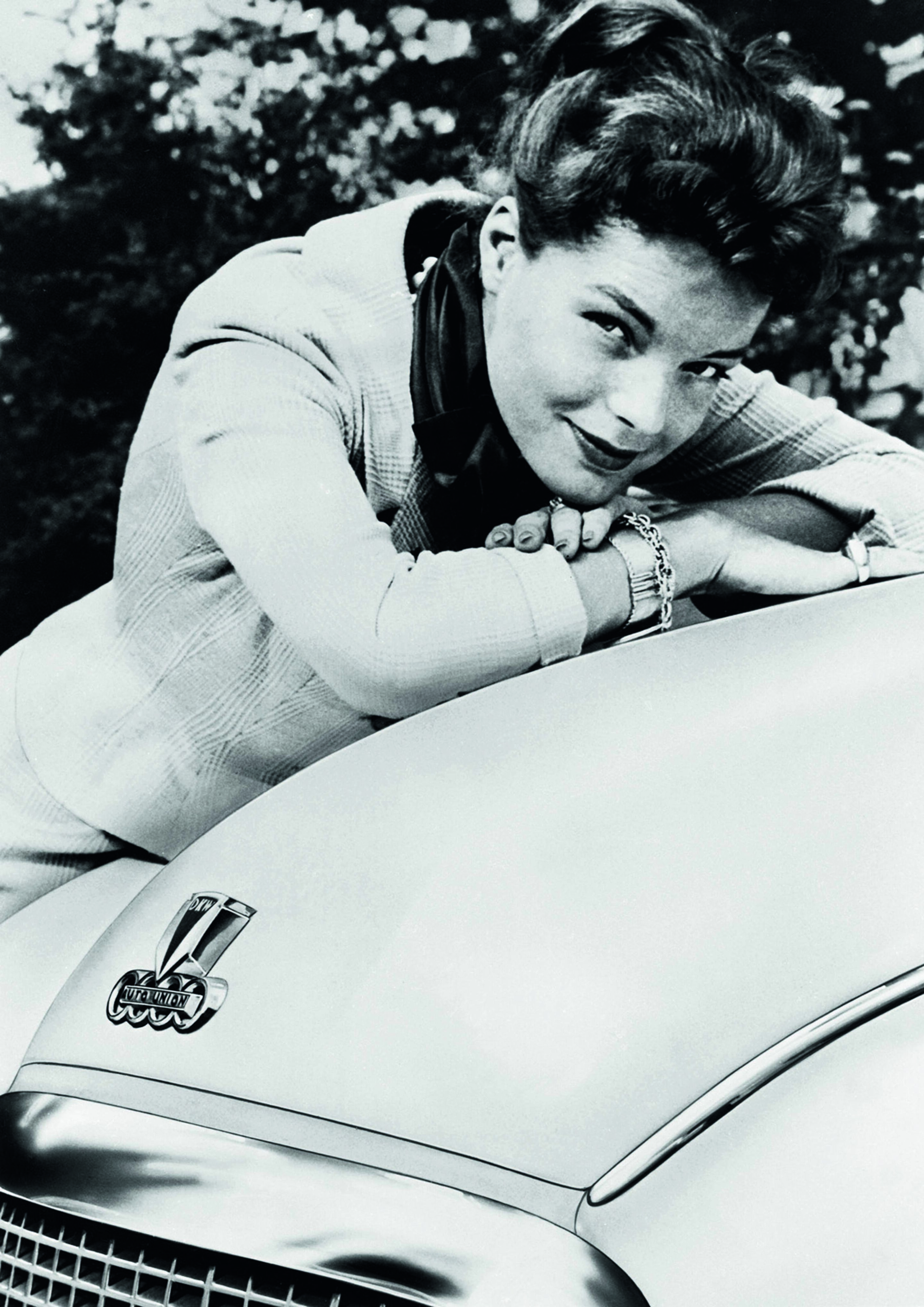 Anniversary magazine History - Advertising in the fifties - German star Romy Schneider poses on the bonnet of a DKW 3 = 6