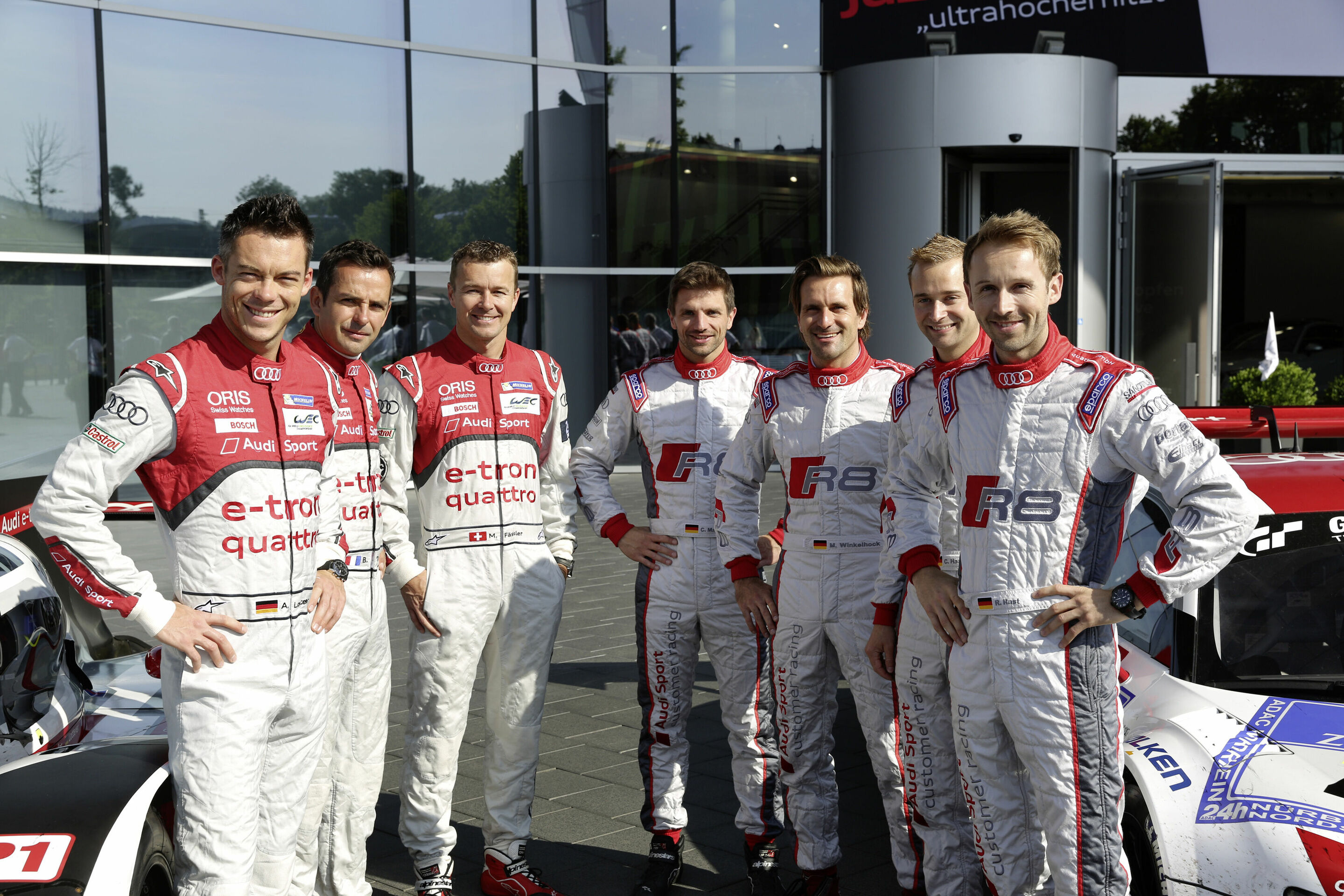 Sieger der 24-Stunden-Rennen von Le Mans und dem Nürburgring am Audi-Standort Neckarsulm - v.l.: André Lotterer, Benoît Tréluyer, Marcel Fässler, Christian Mamerow, Markus Winkelhock, Christopher Haase und René Rast