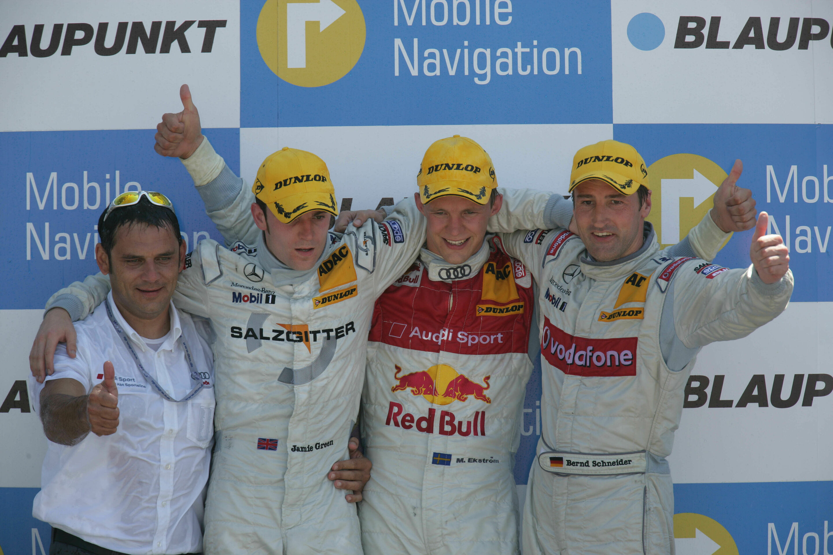 DTM 2006 - Mattias Ekström and Team Director Hans-Jürgen Abt on the podium at Brands Hatch