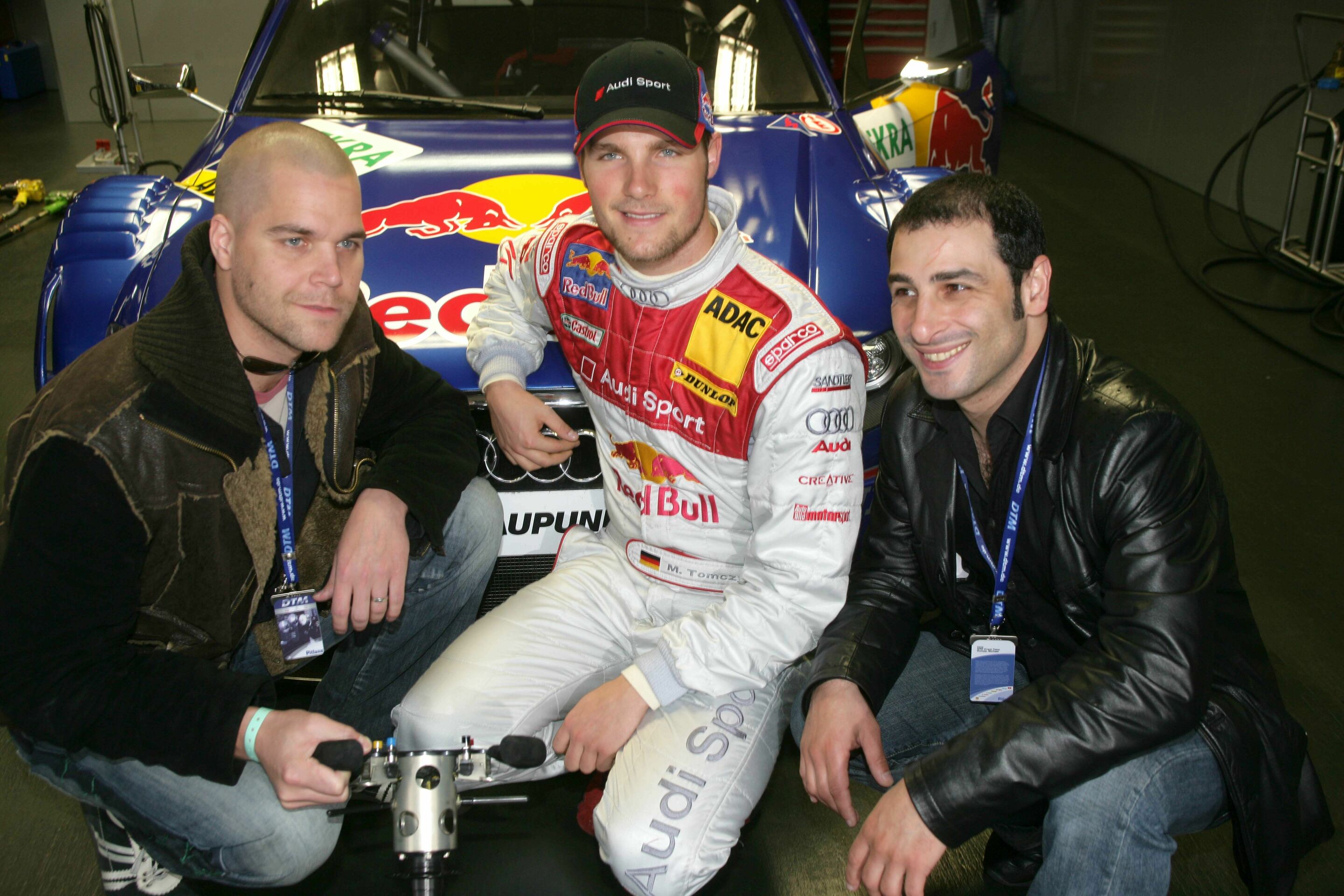 DTM 2005 - Martin Tomczyk mit Vince Bahrdt und Volkan Baydar von Orange Blue