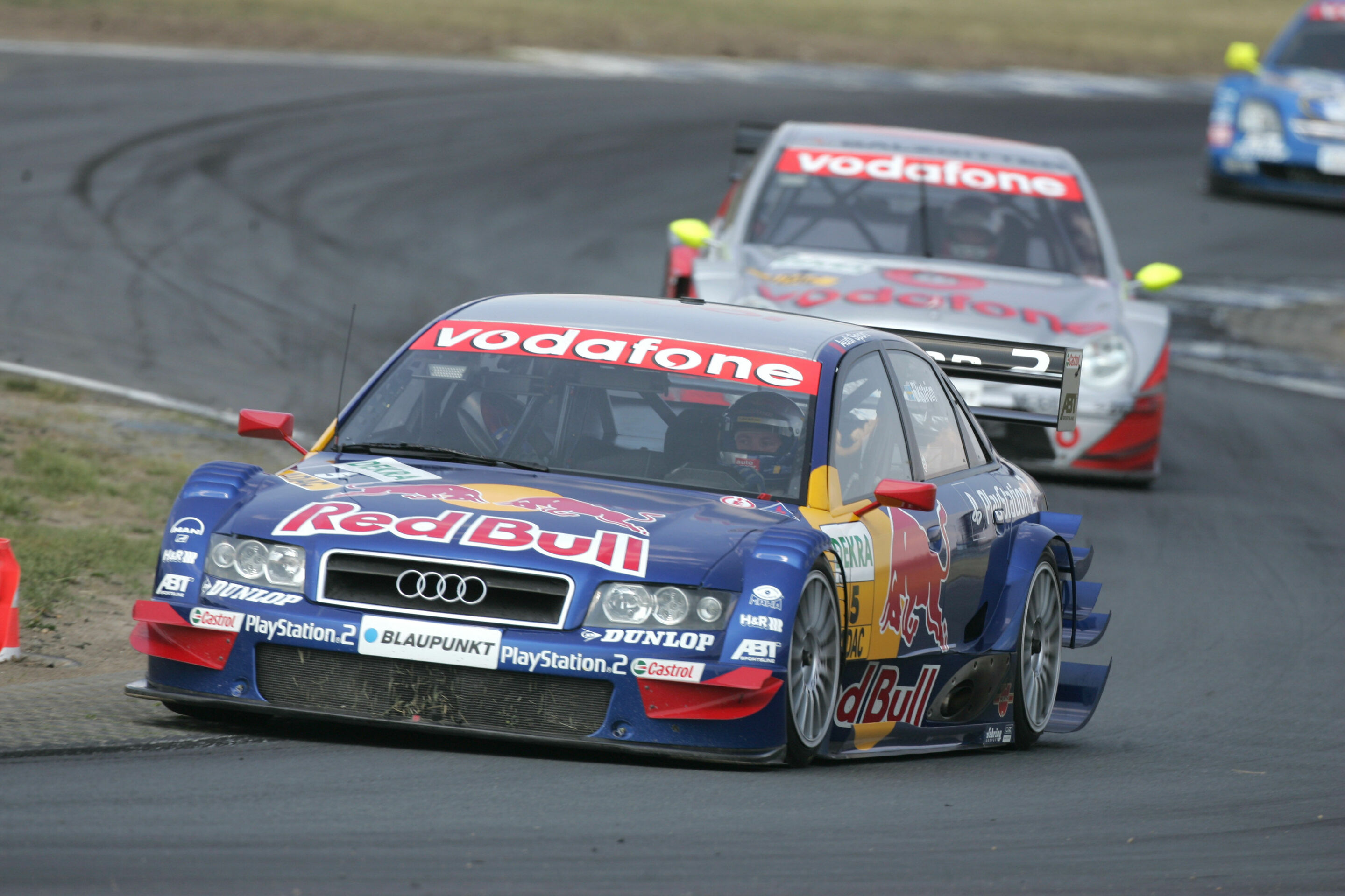 DTM 2004 - Mattias Ekström in front of Bernd Schneider