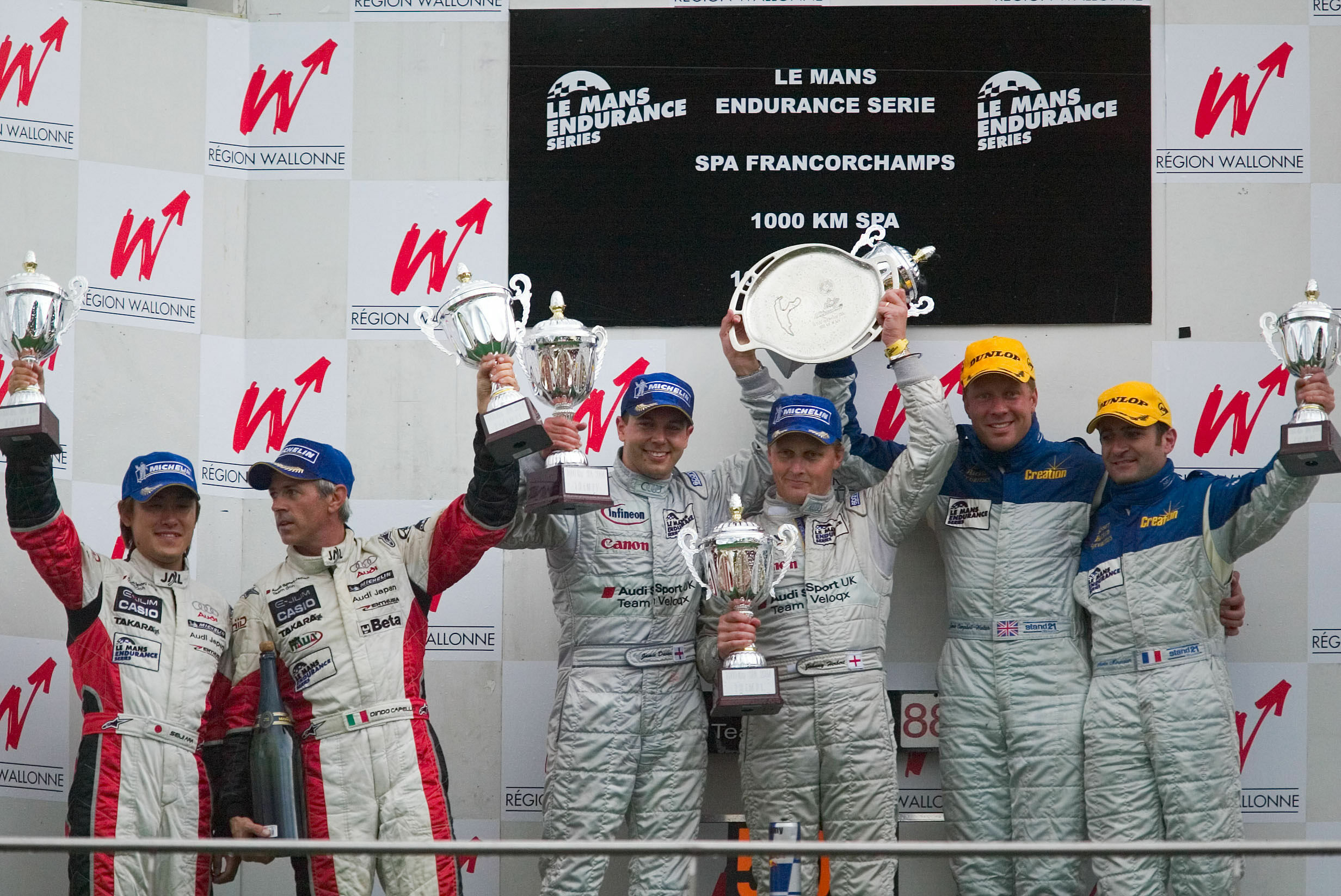 LMES 2004 - The rostrum at Spa. From left: Seiji Ara and Rinaldo Capello (second place), Jamie Davies and Johnny Herbert (winners)