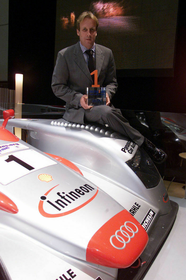 Le Mans 2001 - Frank Biela showing the trophy for the "Sportscar of the year 2001" during the Essen Motor Show