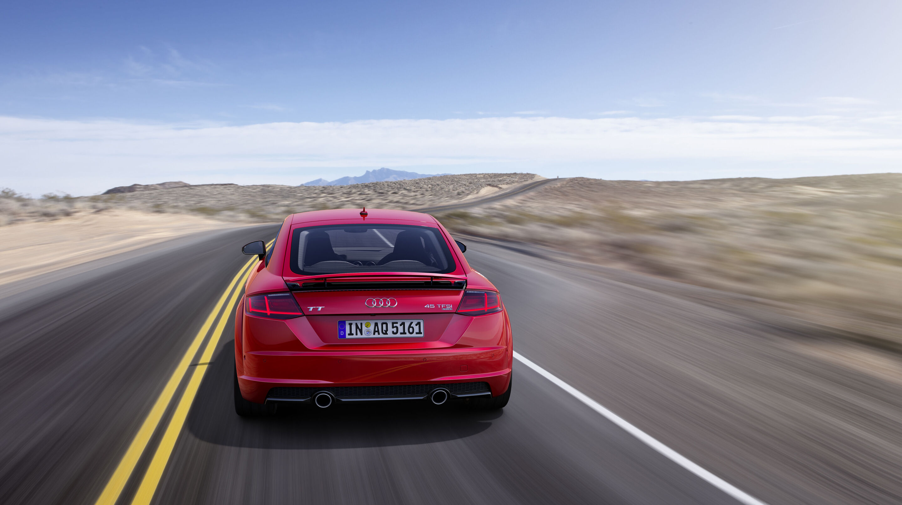 Audi TT Coupé (until 2023) - Dynamic photo, 
Colour: Tango red