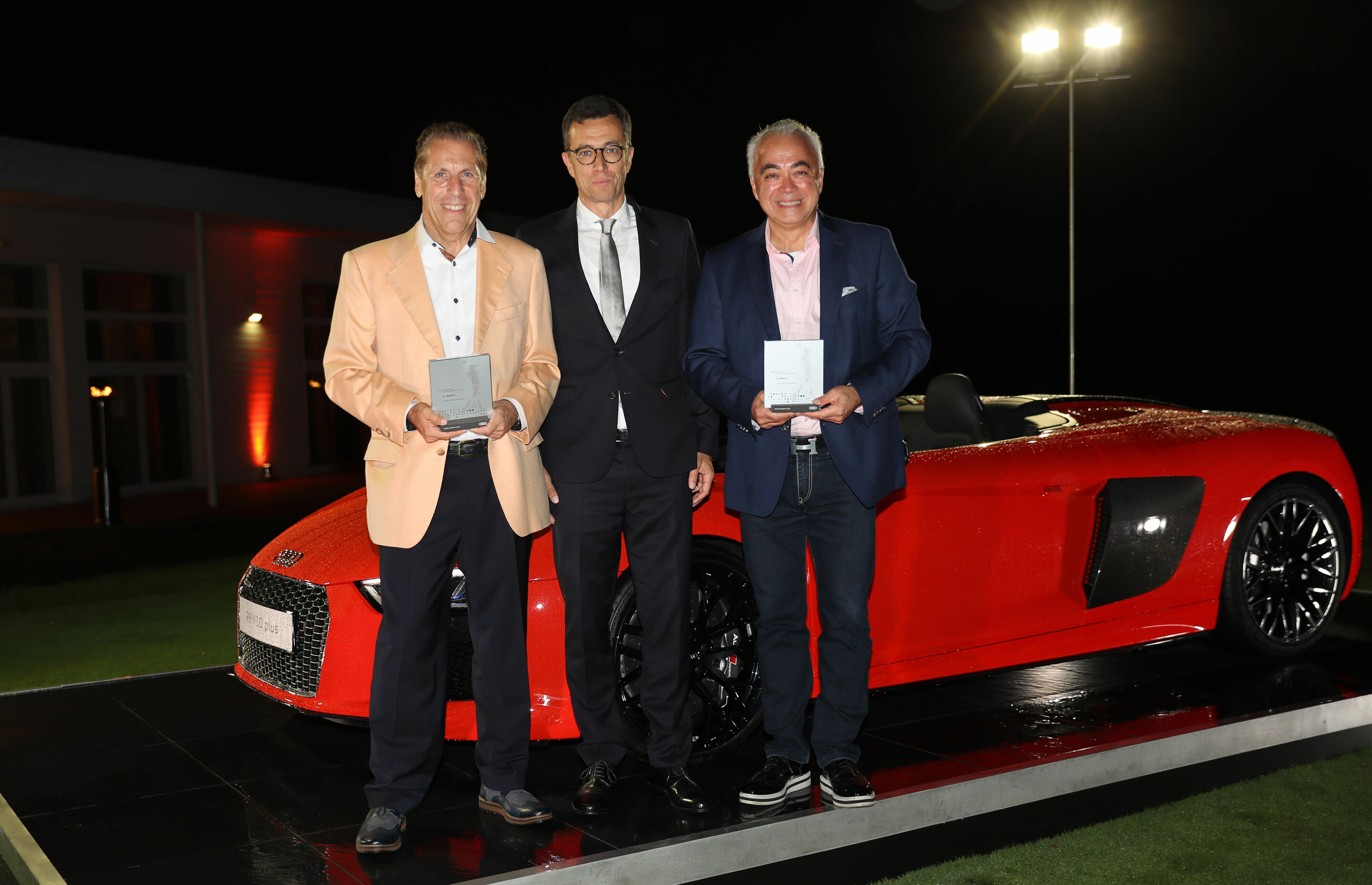 Audi quattro Cup 2018 - German Final - Peter Hünnighausen from Golfclub Salzgitter and Ridvan Abay from Golfclub Laineck-Bayreuth with Jason Lusty (middle), Marketing Chef of the Audi AG