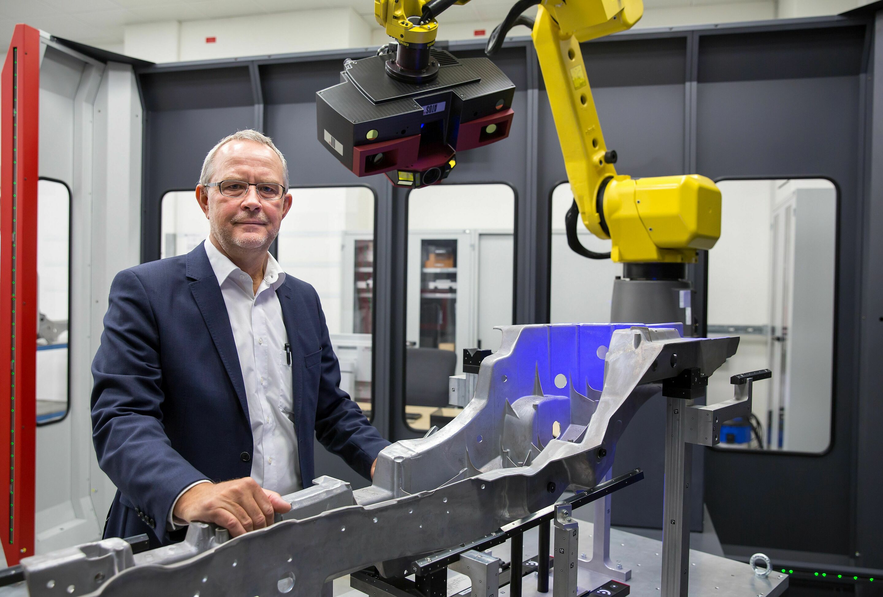 Five years of Audi production in Münchsmünster - Thomas Sukowski, Head of Audi Production in Münchsmünster and Head of Module and System Production in Ingolstadt, shows an optical measuring machine: A rear longitudinal is automatically controlled in the...