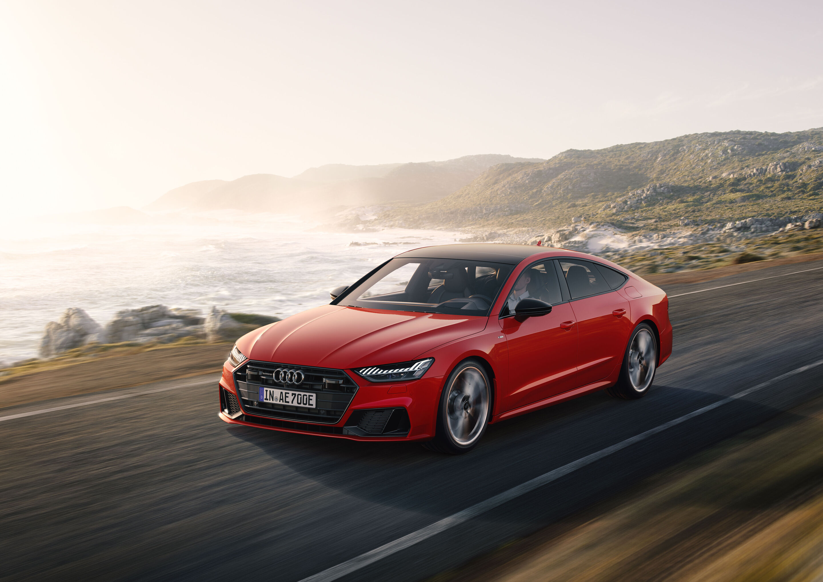 Audi A7 Sportback 55 TFSI e quattro (until 2025) - Dynamic photo,
Colour: Tango red