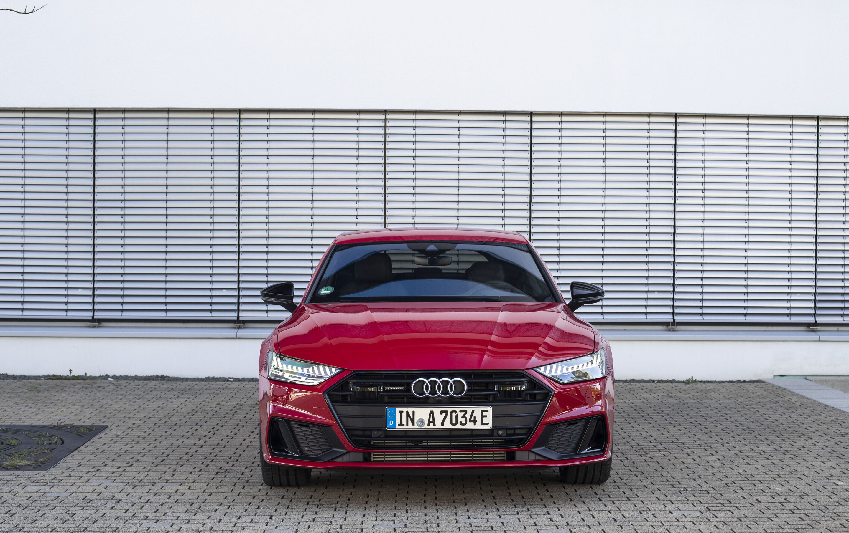 Audi A7 Sportback 55 TFSI e quattro (until 2025) - Static photo,
Colour: Tango red
