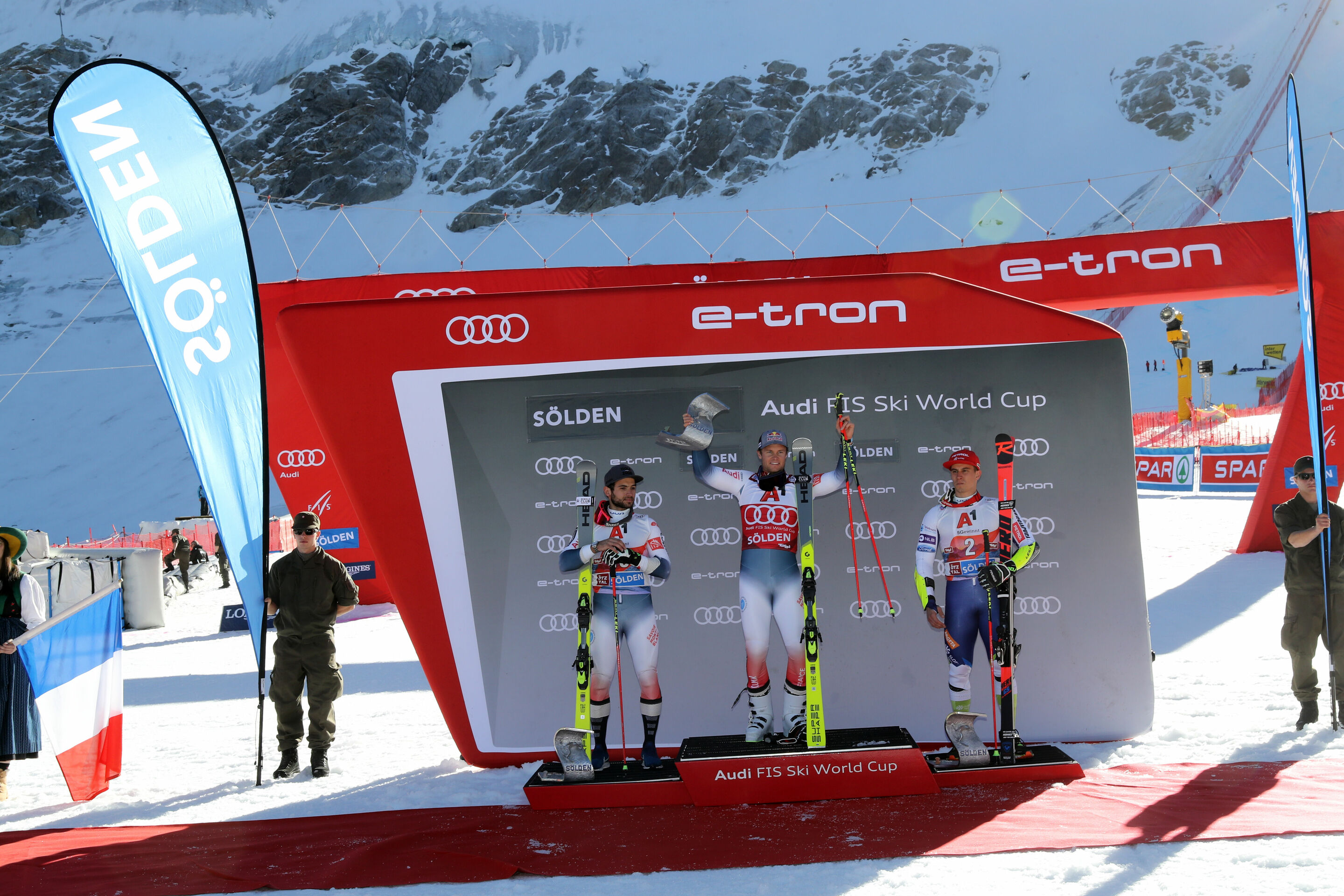 Audi FIS Ski World Cup Opening 2019 in Sölden - The winner's podium. Mathieu Faivre (FRA, left) takes 2nd place, Alexis Pinturault (FRA, middle) takes 1st place, Zan Kranjec (SLO, right) takes 3rd place