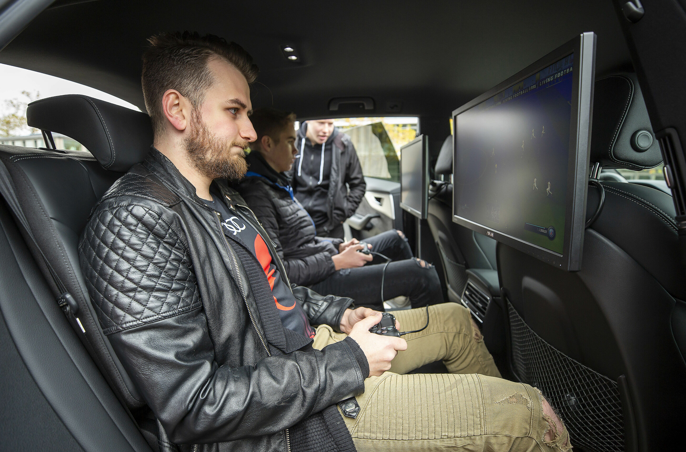 "Beat the Pro" event with "FOKUS CLAN" players Mohammed "MoAuba" Harkous and Matthias "Stylo" Hietsch - Matthias "STYLO" Hietsch at Playstation 4 playing with an Audi employee in the Audi Q8