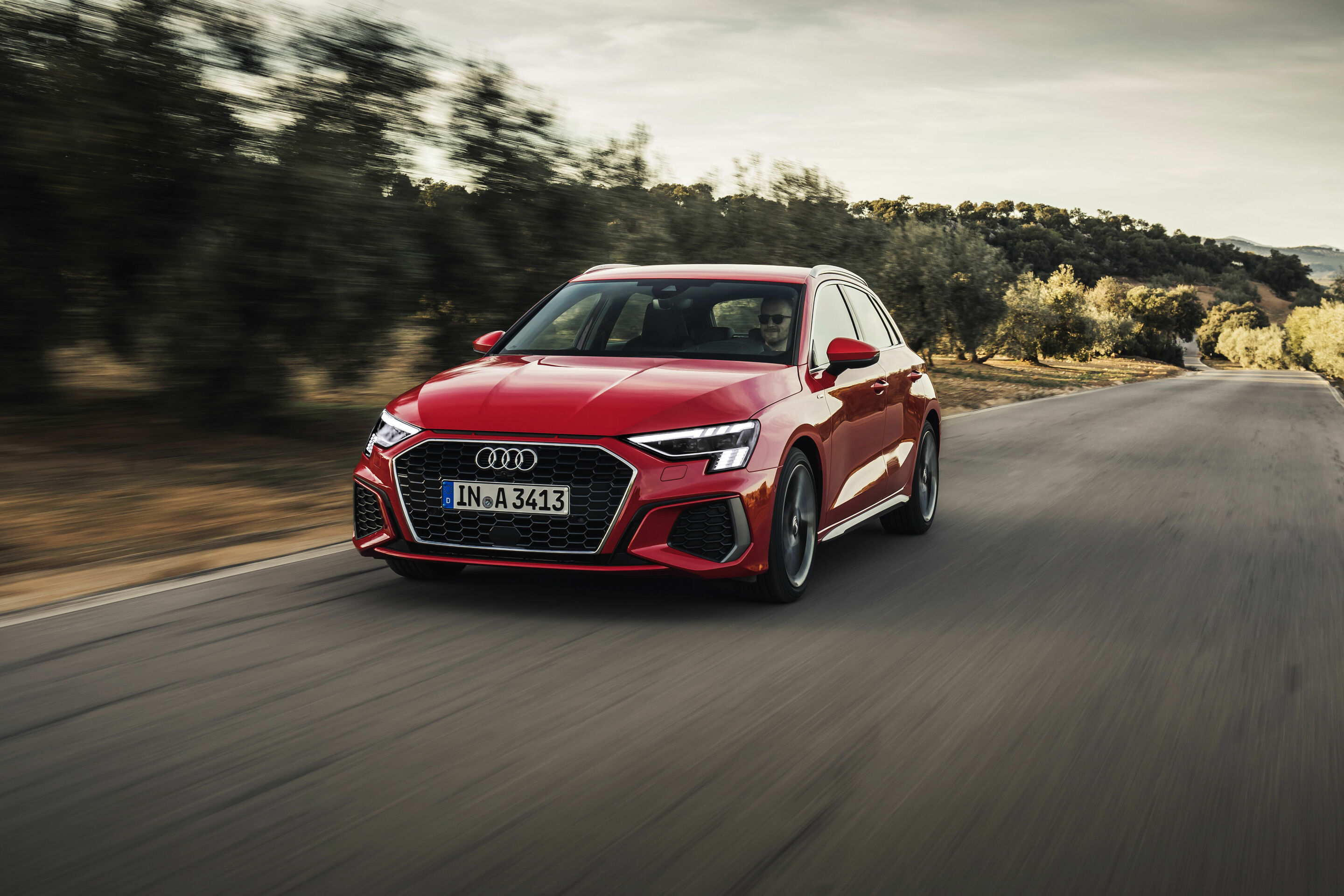 Audi A3 Sportback - Dynamic photo,
Colour: tango red