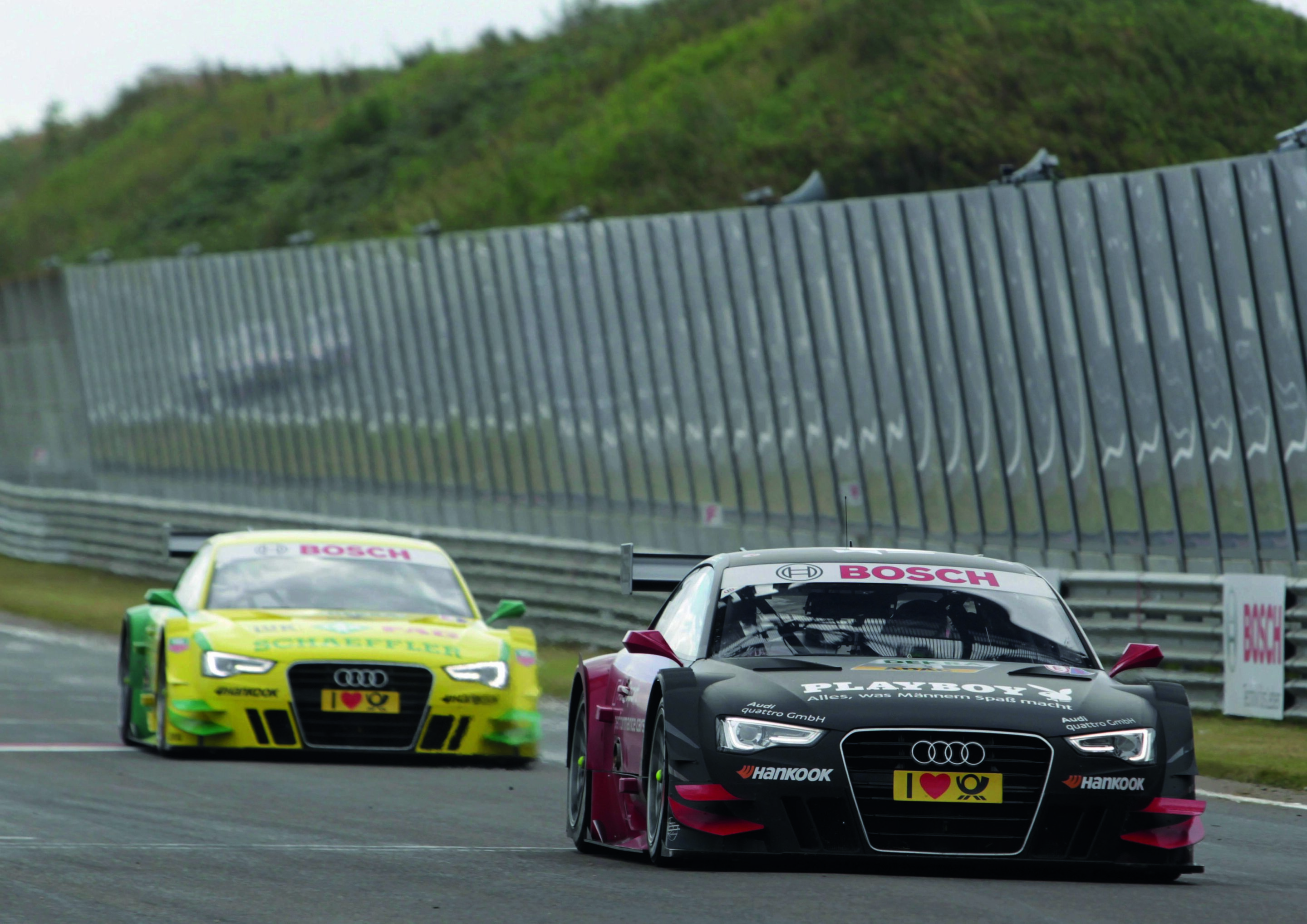 Audi one-two-three victory at Zandvoort - Edoardo Mortara, Playboy Audi A5 DTM #21 (Audi Sport Team Rosberg), Mike Rockenfeller, Schaeffler Audi A5 DTM #9 (Audi Sport Team Phoenix).